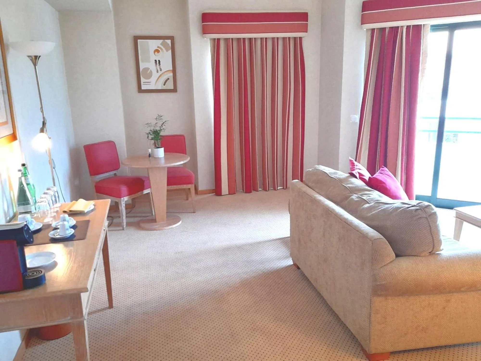 Communal lounge/ TV room in Riviera Hotel