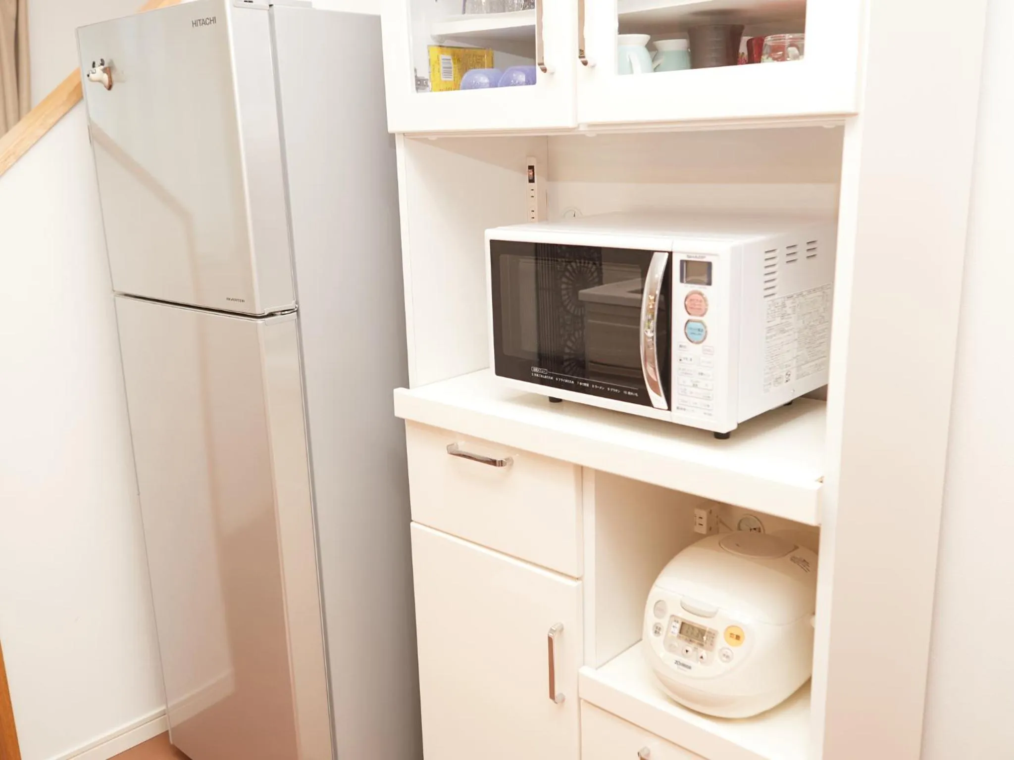 Communal kitchen in The Pool Resort Villa Hasta Manana