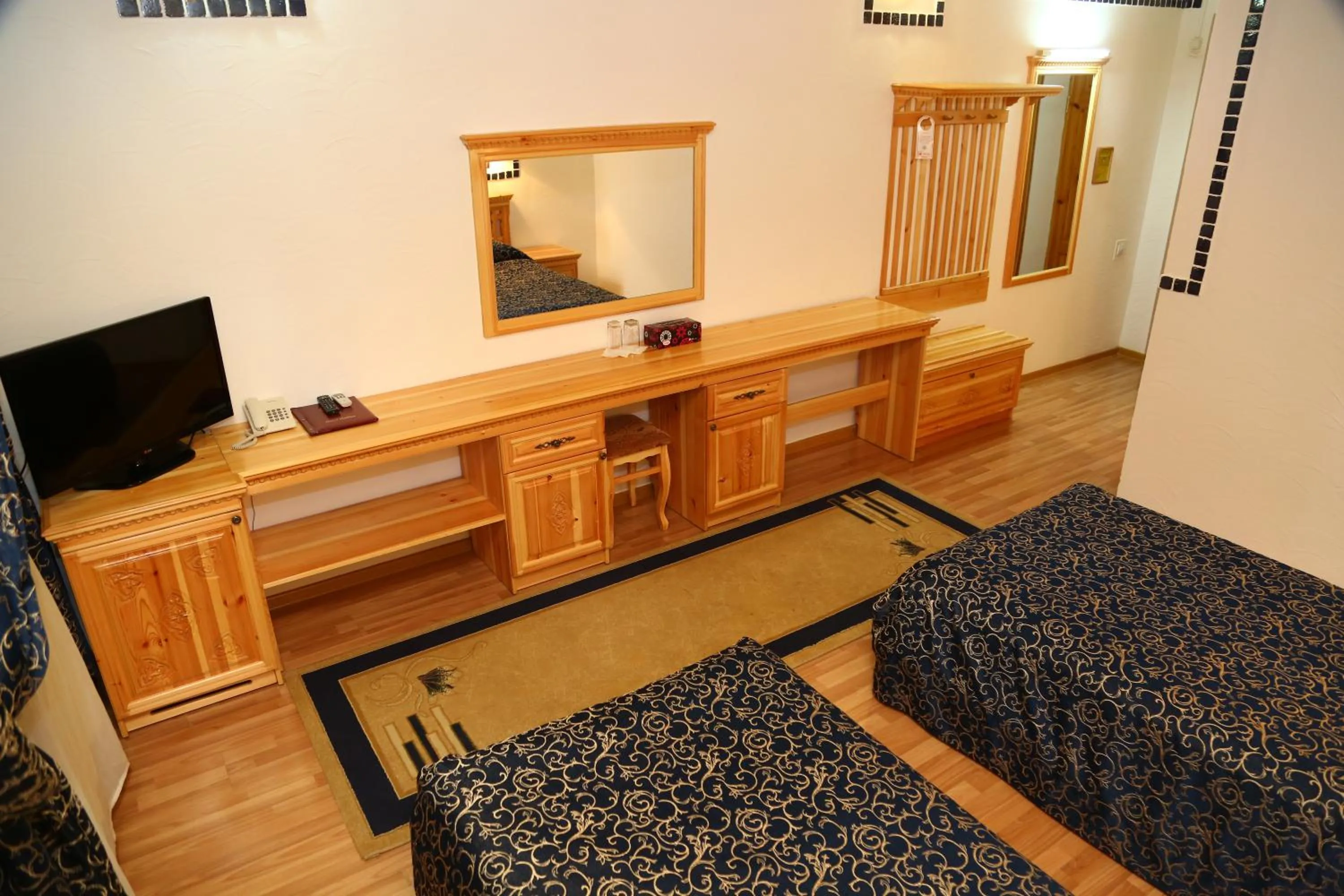 TV and multimedia, Bed in Malika Prime Hotel