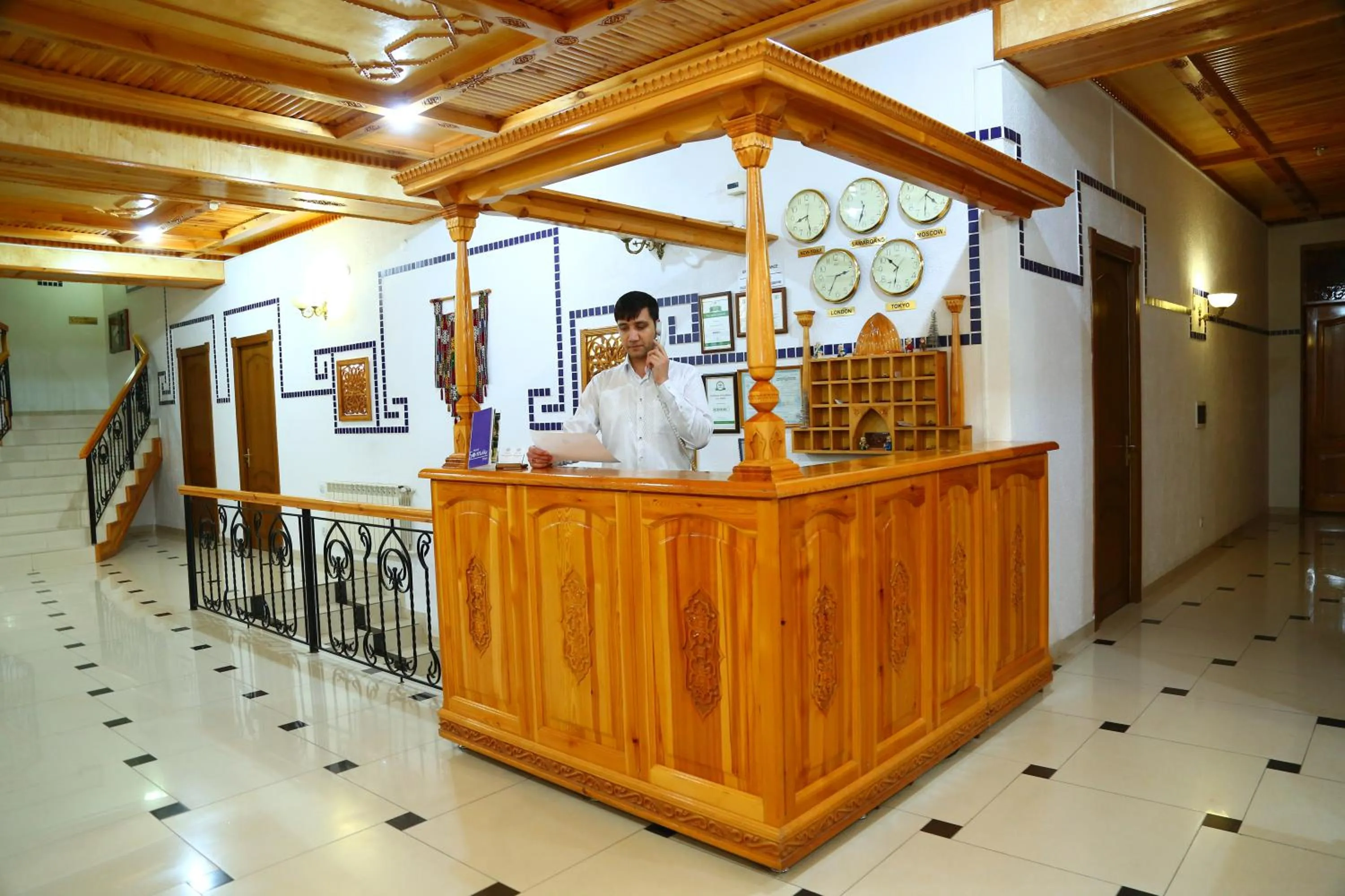 Communal lounge/ TV room in Malika Prime Hotel