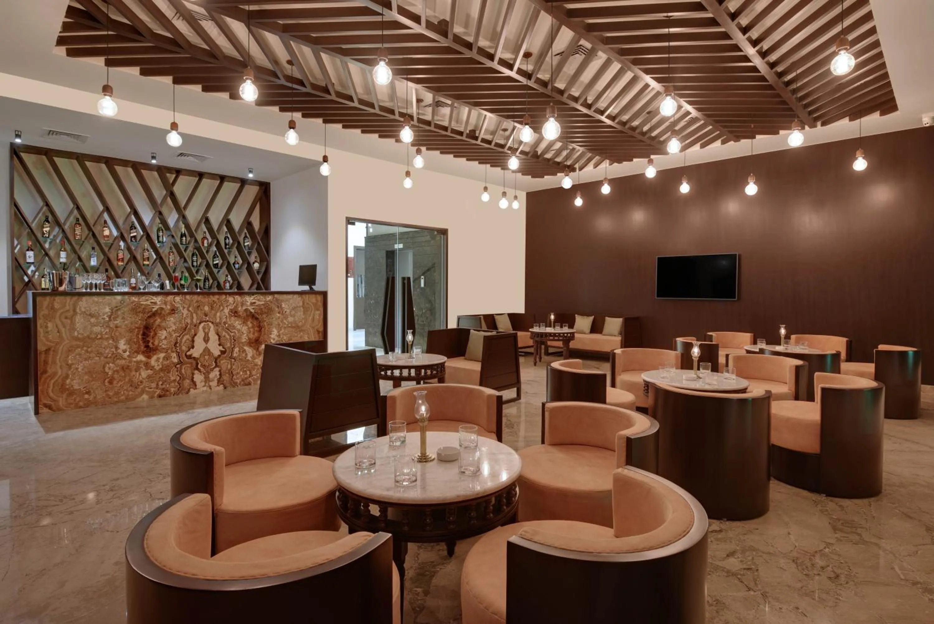 Lounge or bar in The Kumbha Residency by Trulyy - A Luxury Resort and Spa