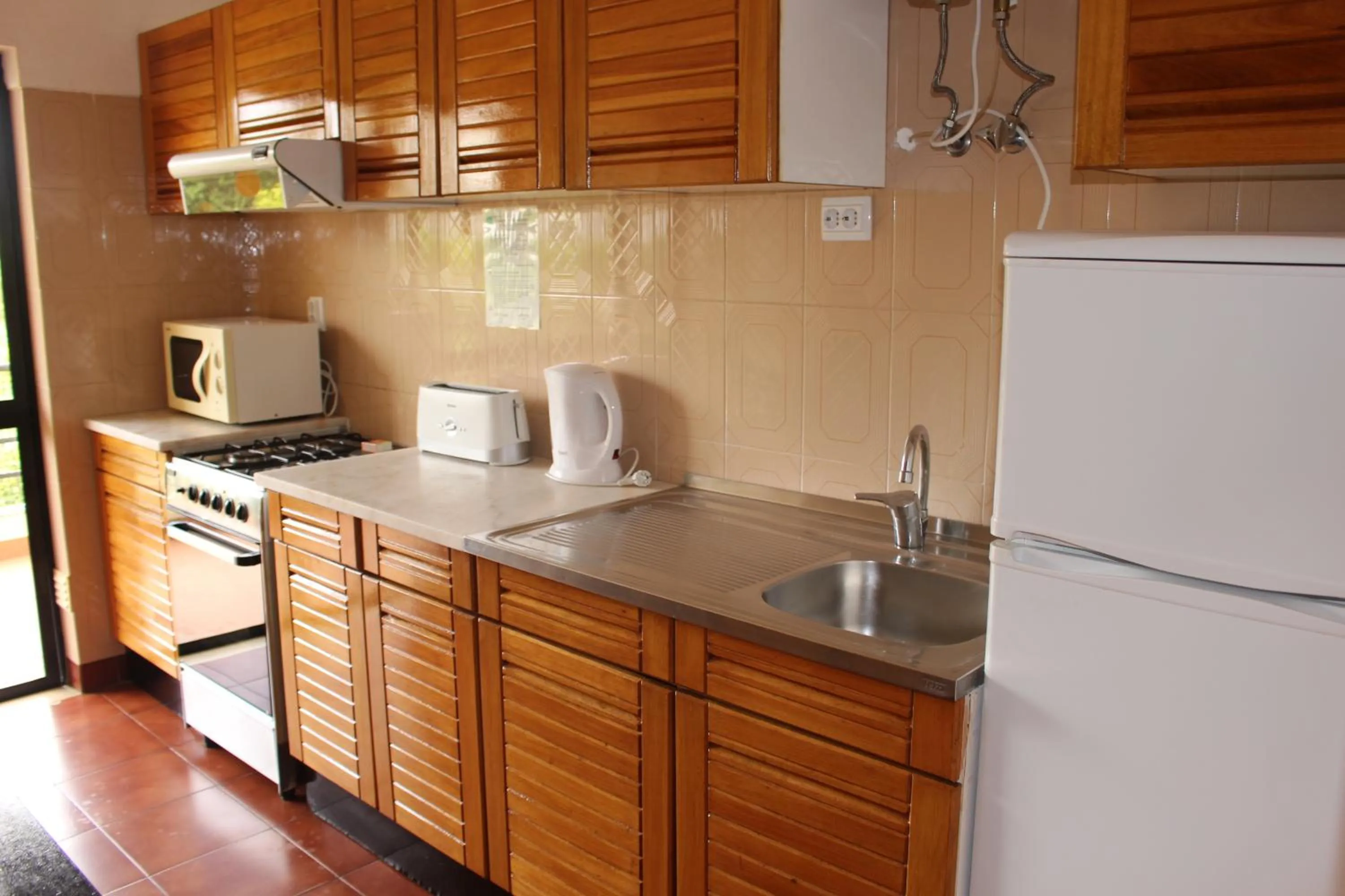 Kitchen or kitchenette in Clube Alvorférias