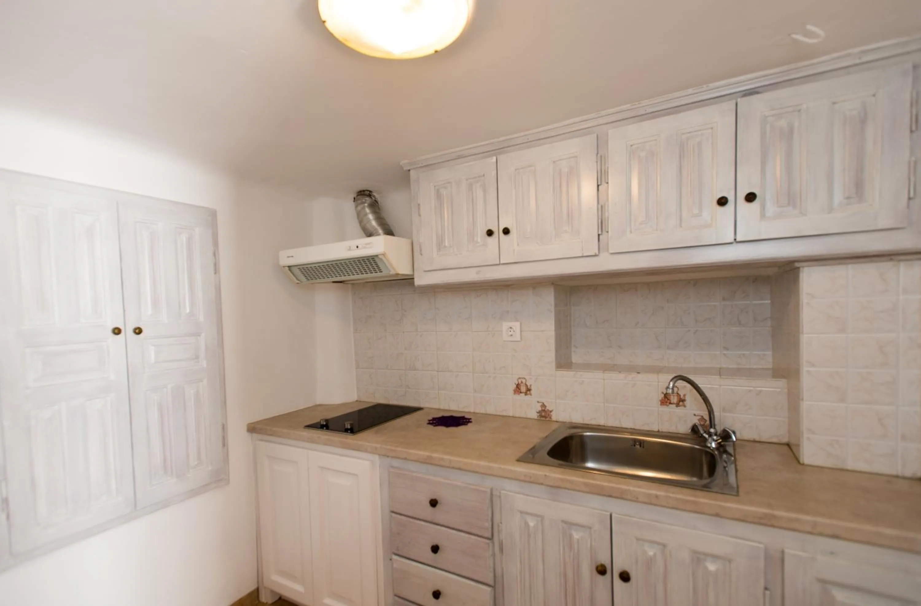 Kitchen or kitchenette in Madres Houses