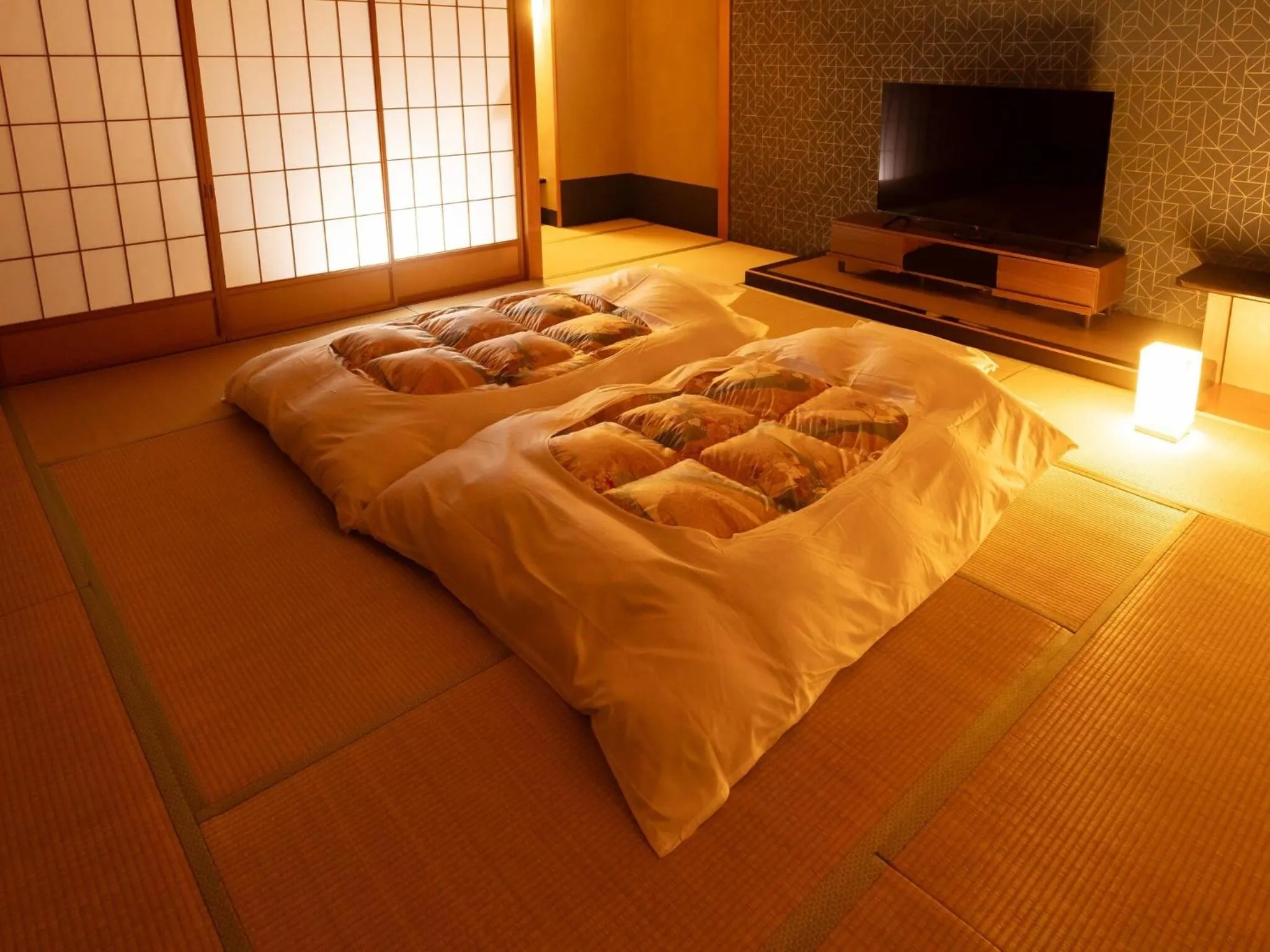 Photo of the whole room, Bed in Dogashima New Ginsui