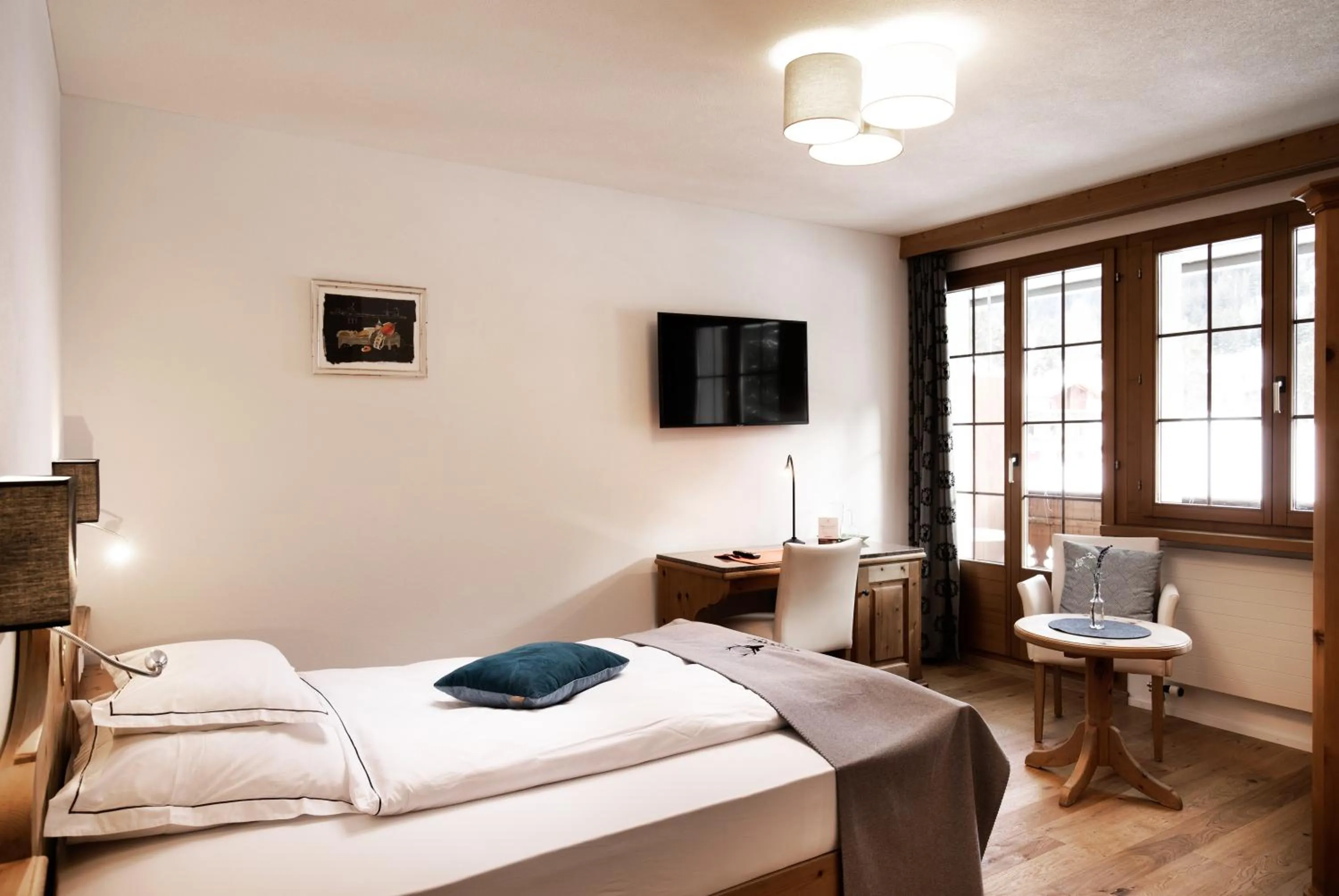 Photo of the whole room, Bed in Hotel Waldhaus am See