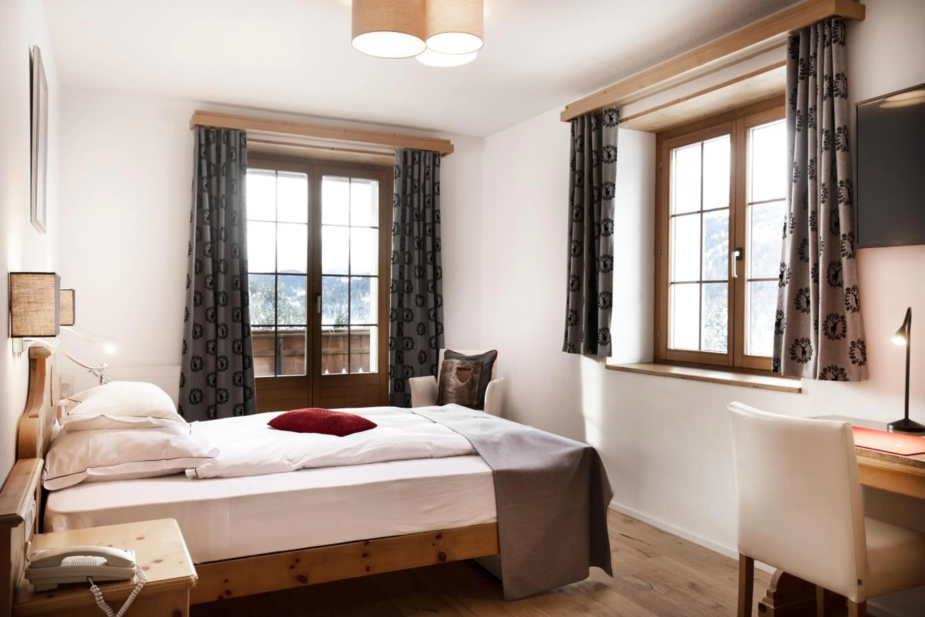 Photo of the whole room, Bed in Hotel Waldhaus am See