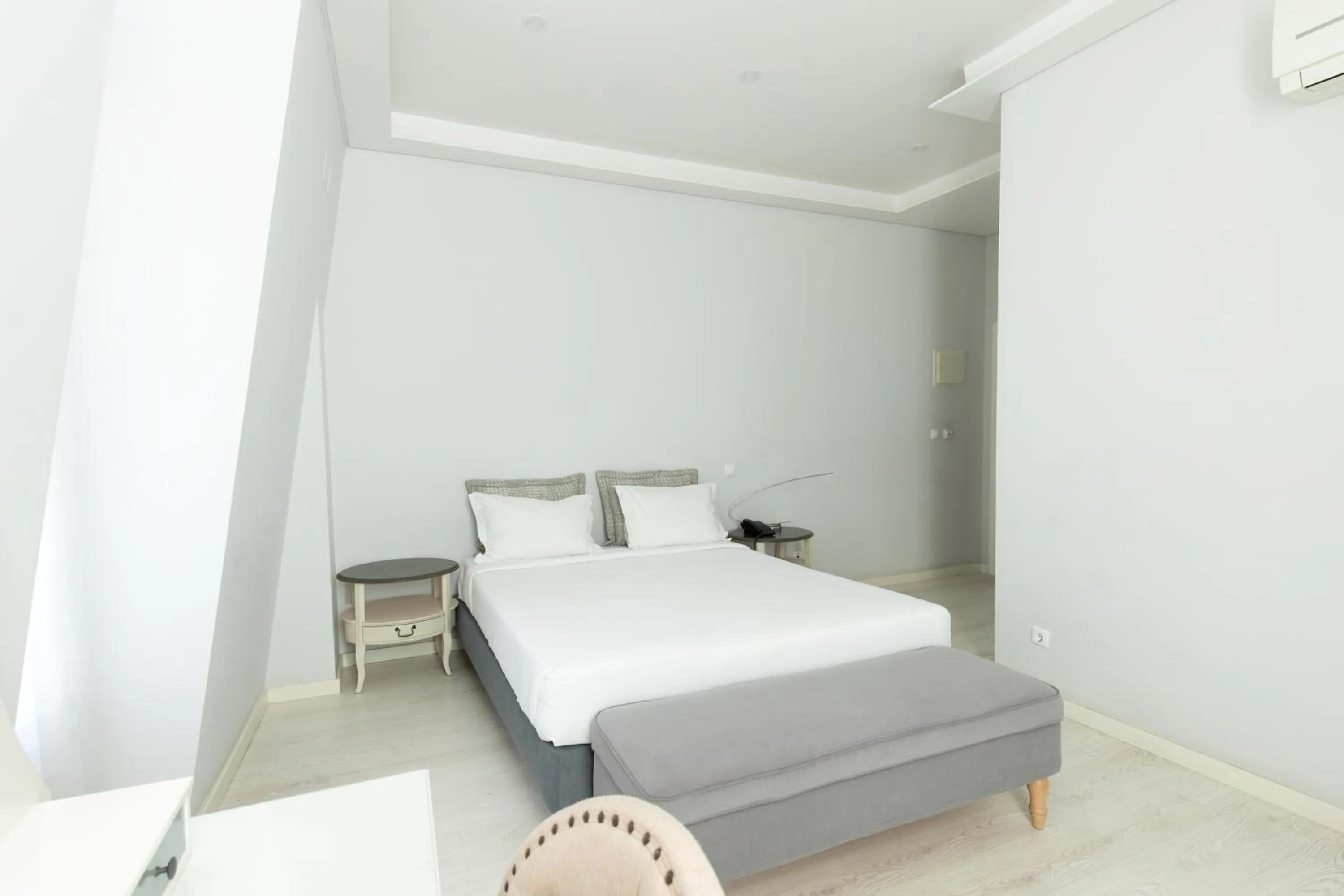 Bed in Grande Pensao Residencial Alcobia