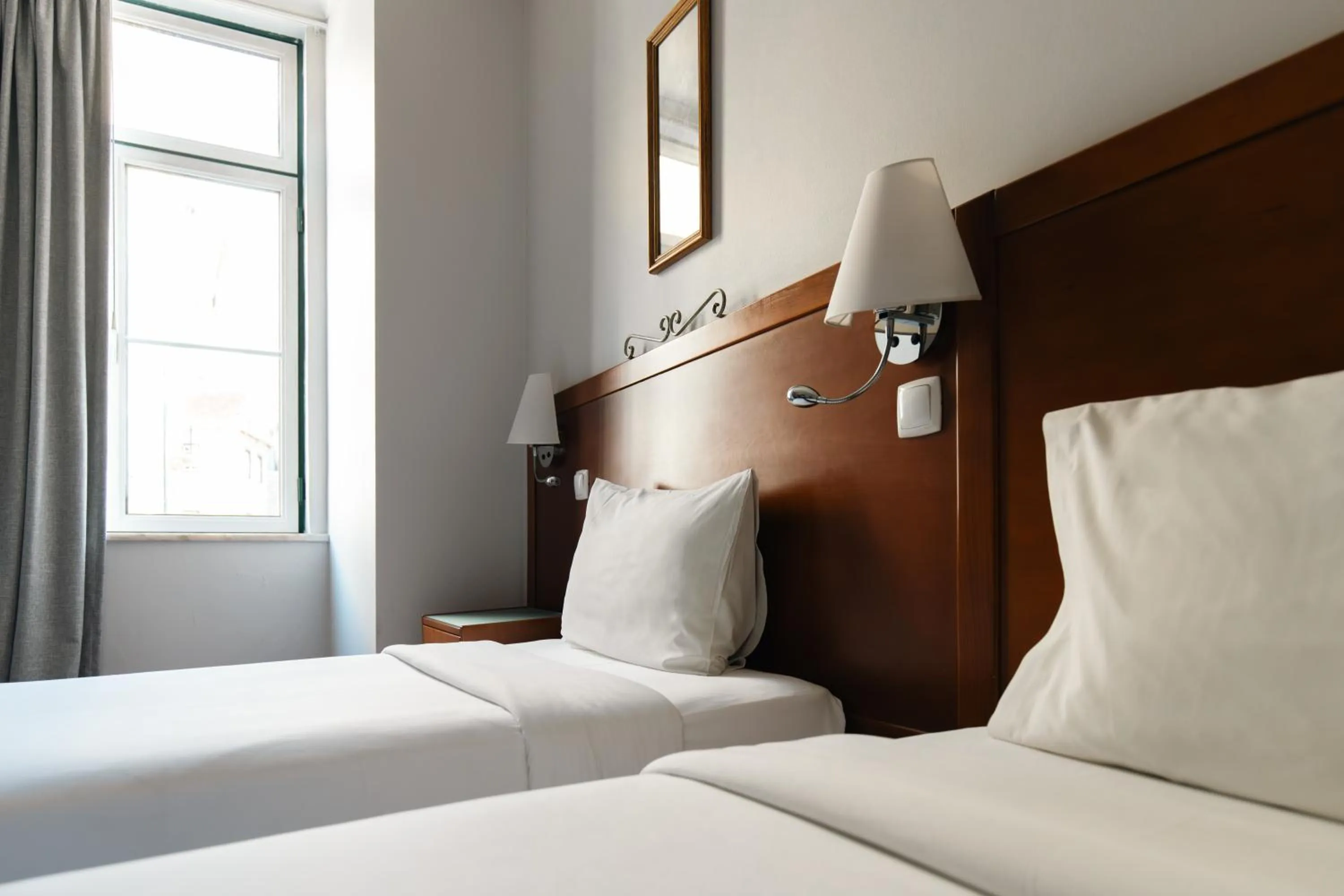 Bed in Grande Pensao Residencial Alcobia