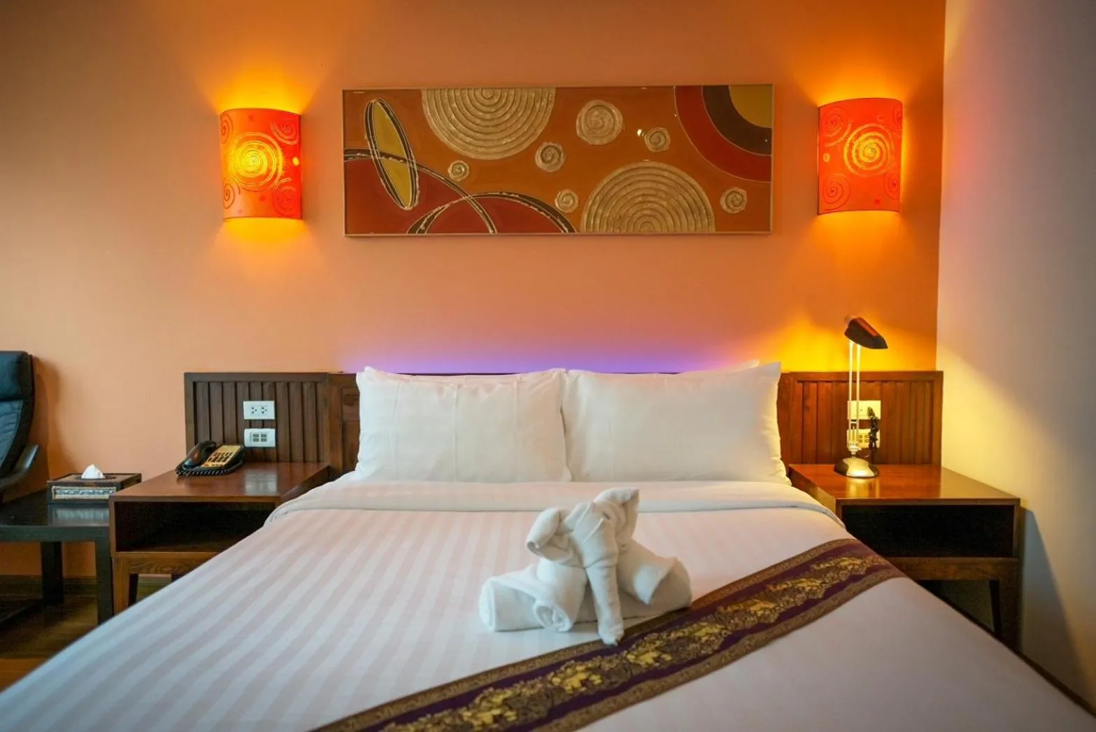 Bed in Hotel Mermaid Bangkok