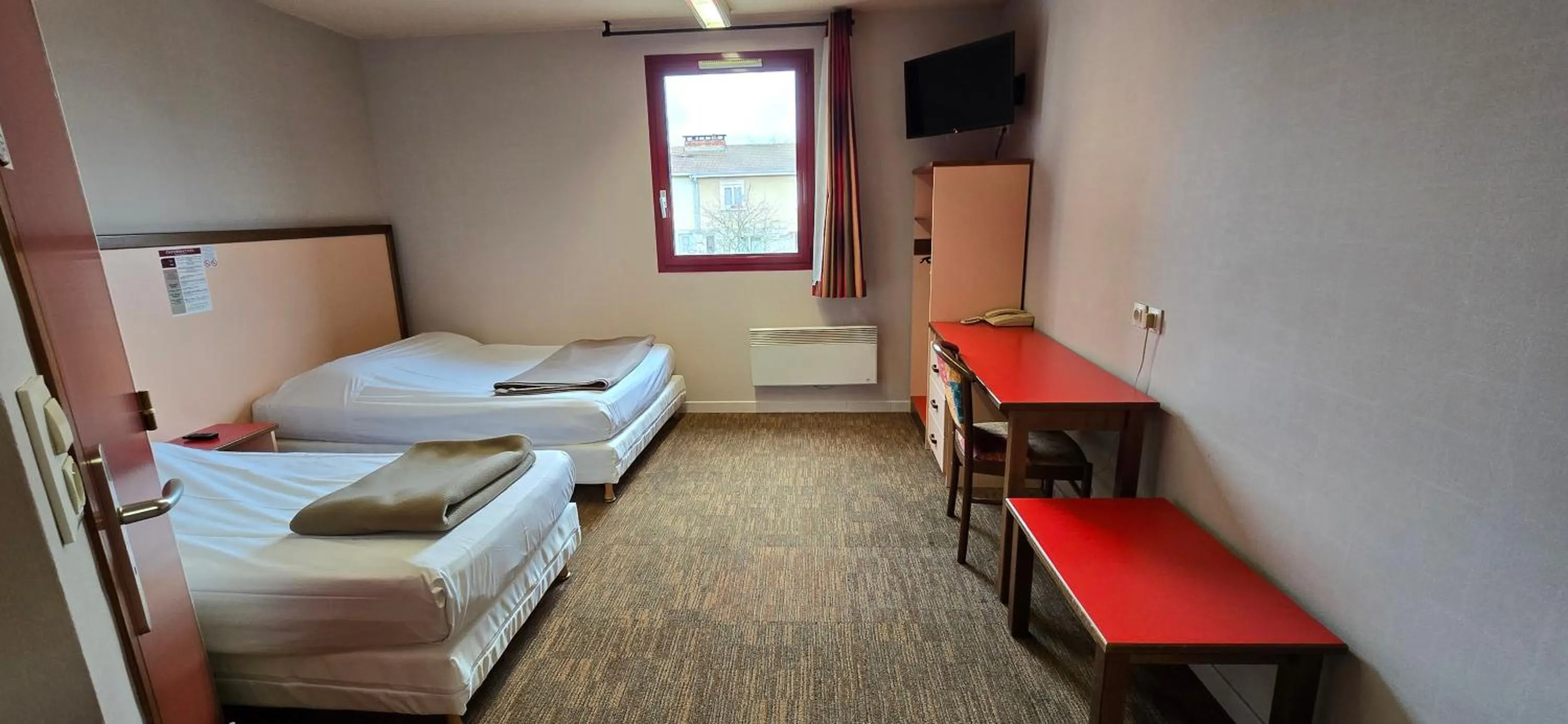 Bed in Hôtel Siatel Besançon Chateaufarine