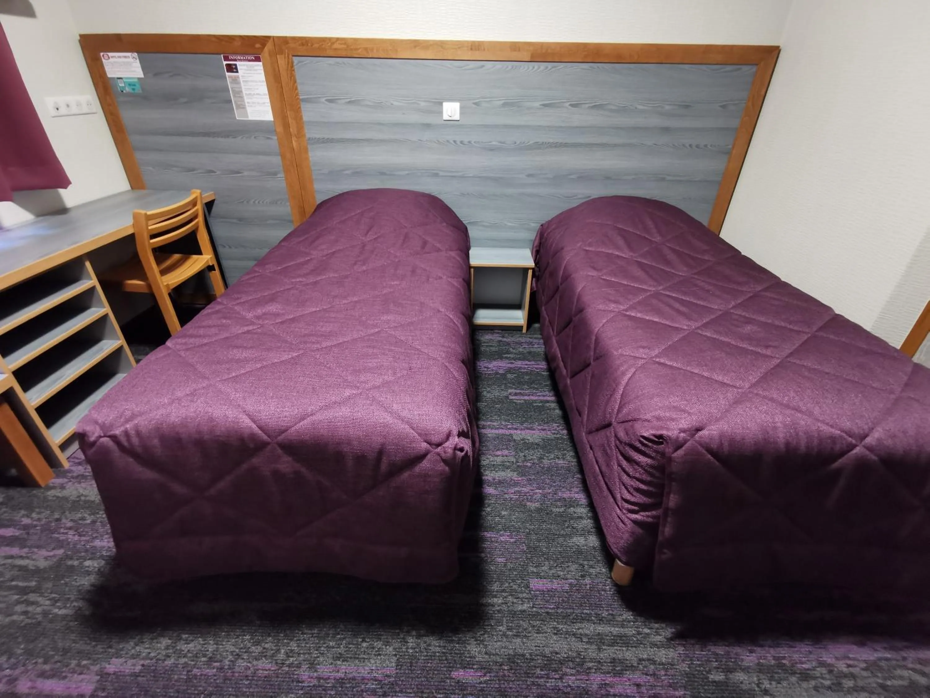 Bed in Hôtel Siatel Besançon Chateaufarine