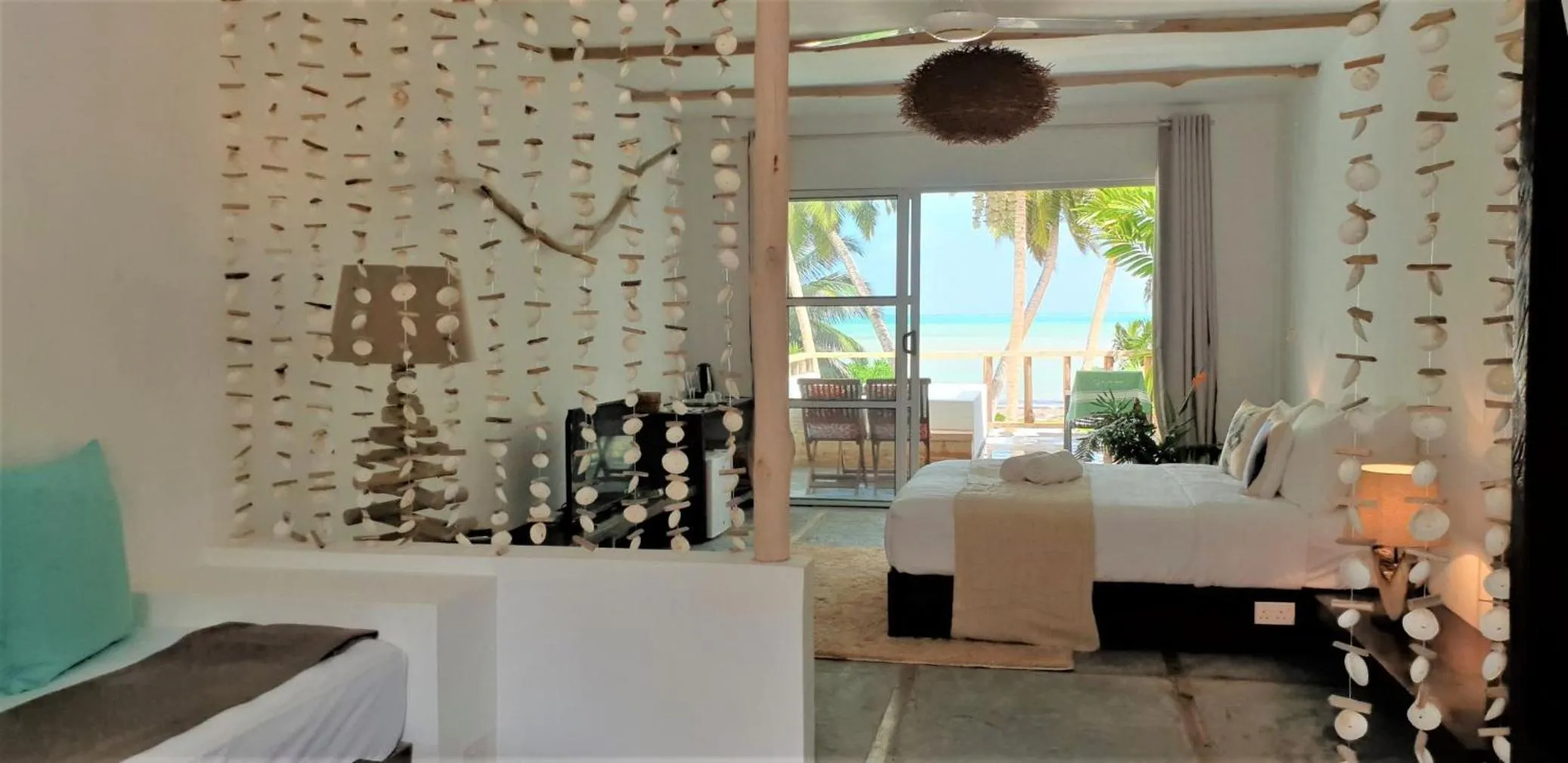 Bed in Bliss Hotel Praslin