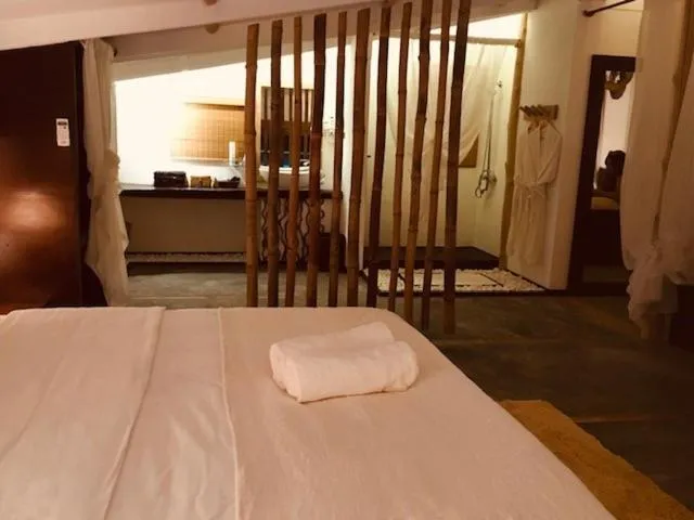 Bed in Bliss Hotel Praslin
