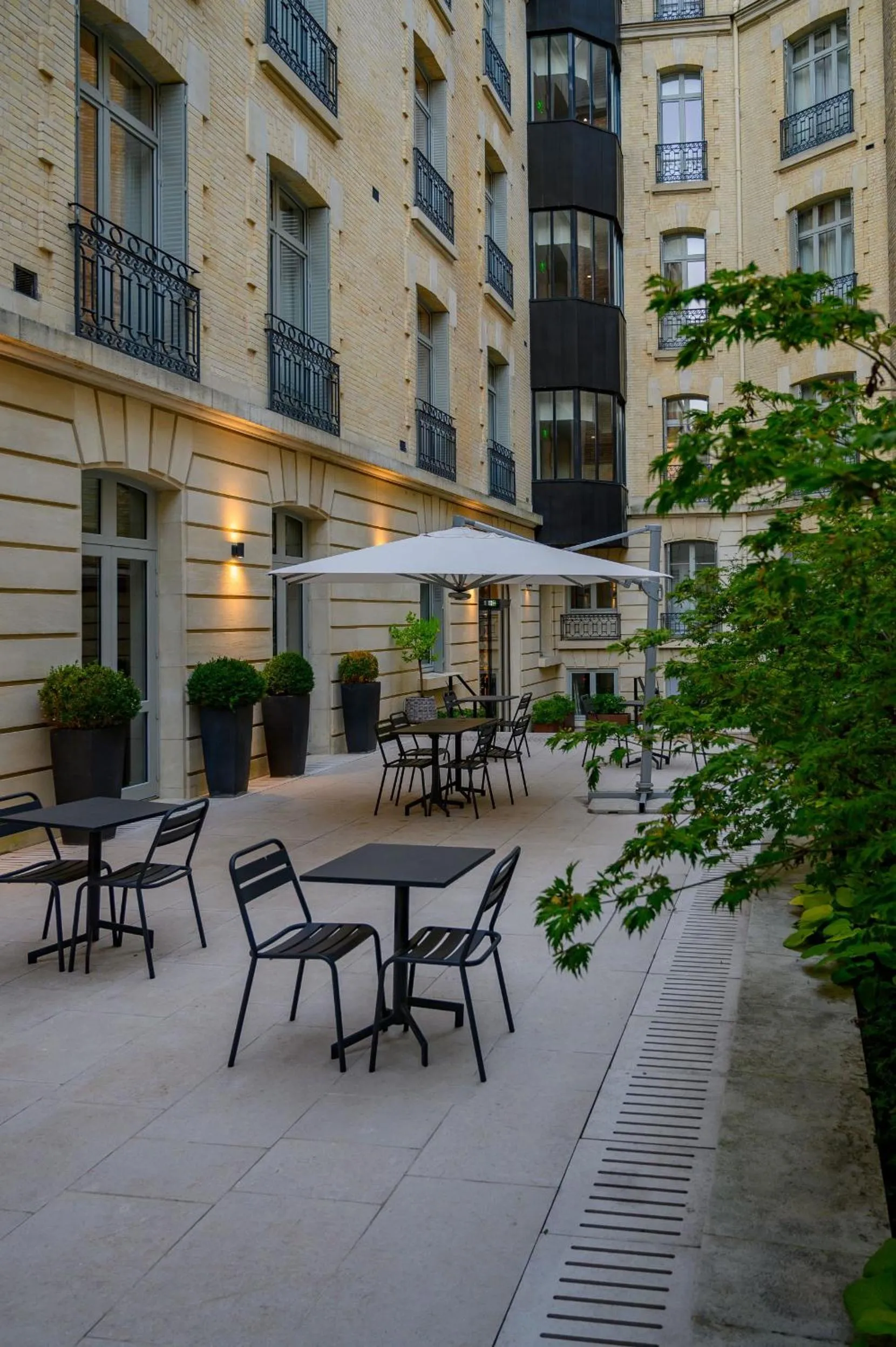 Garden in La Clef Champs-Élysées Paris by The Crest Collection