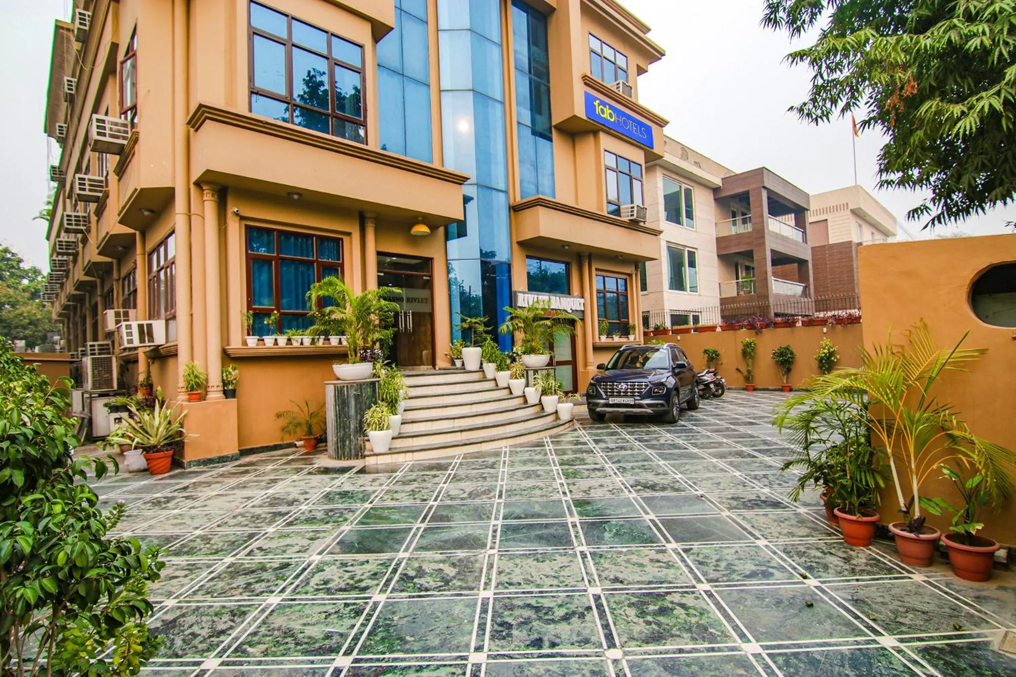 Parking in FabHotel Prime The Rivlet - MG Road & Sikanderpur Metro