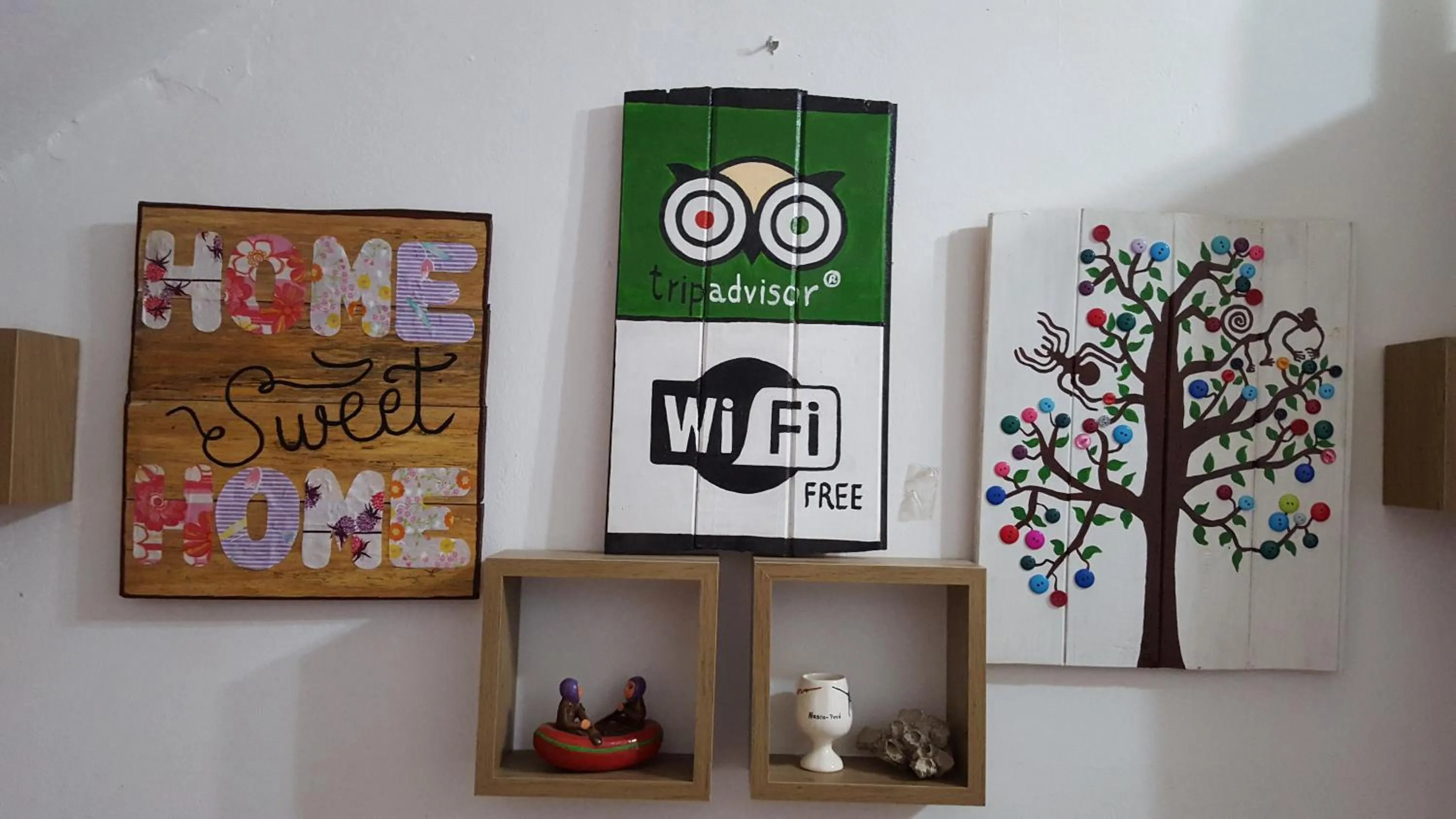 Property logo or sign in Anccalla Inn Guesthouse