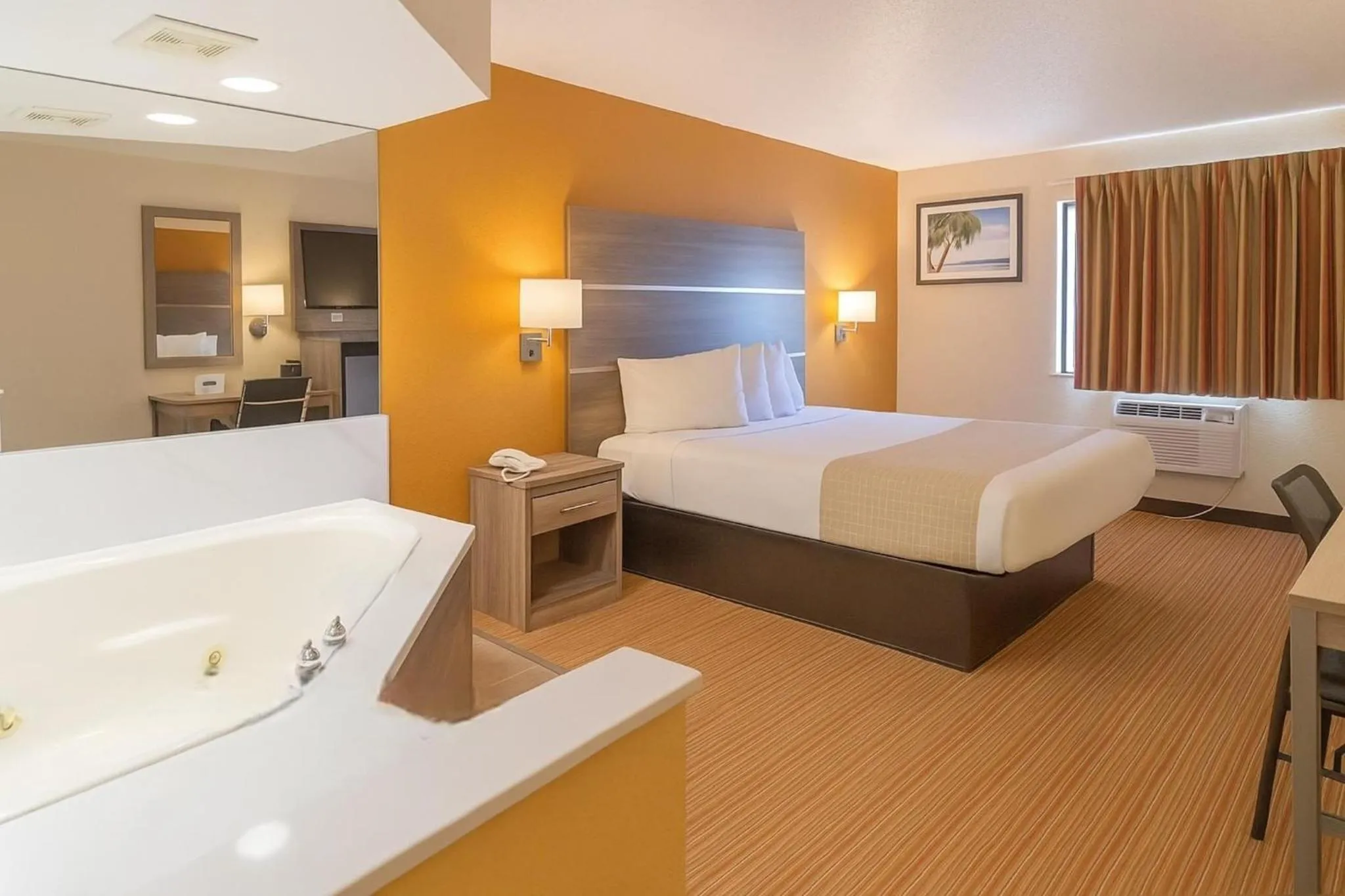 Bed in Travelodge by Wyndham Muskegon