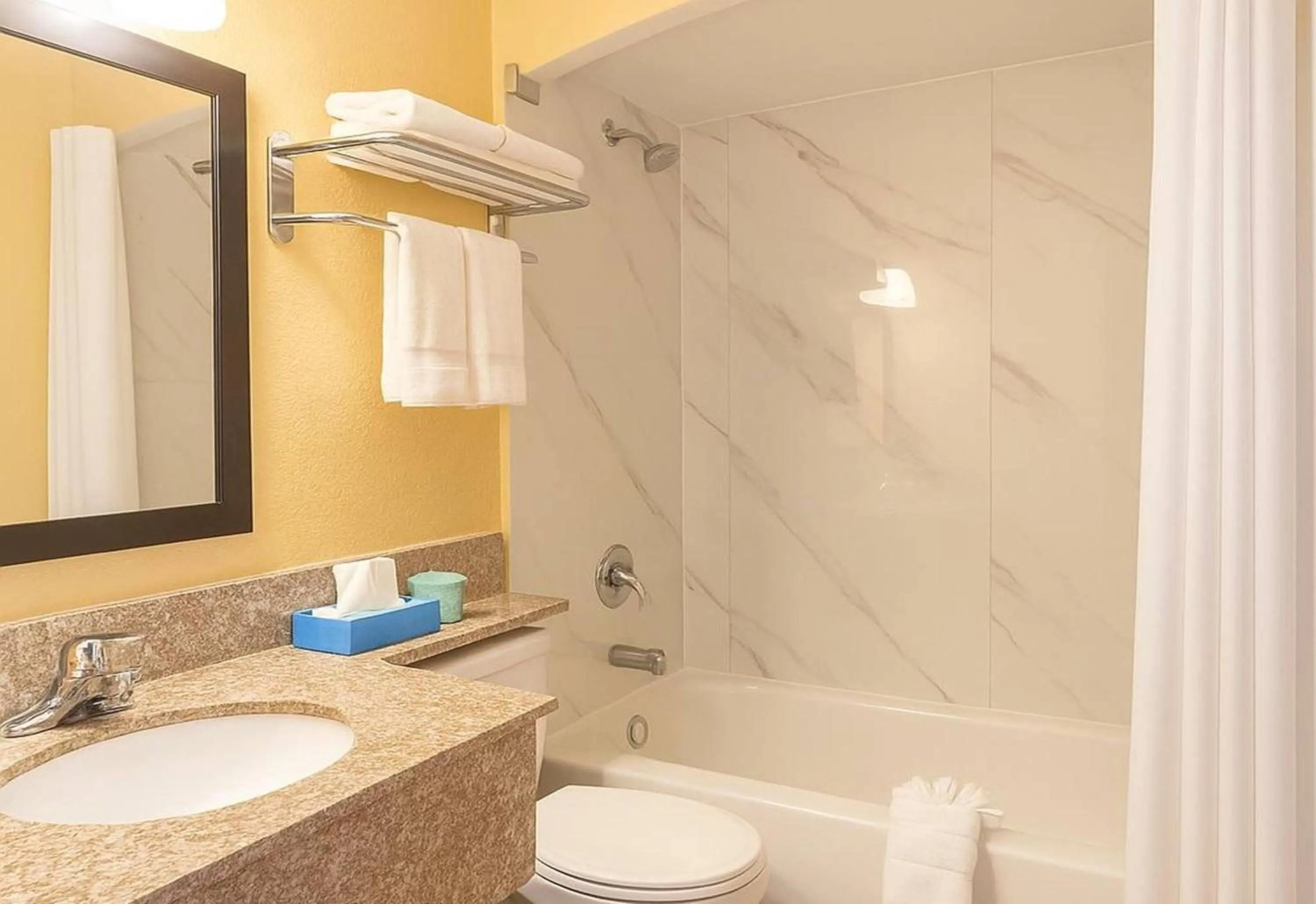 Bathroom in Travelodge by Wyndham Muskegon