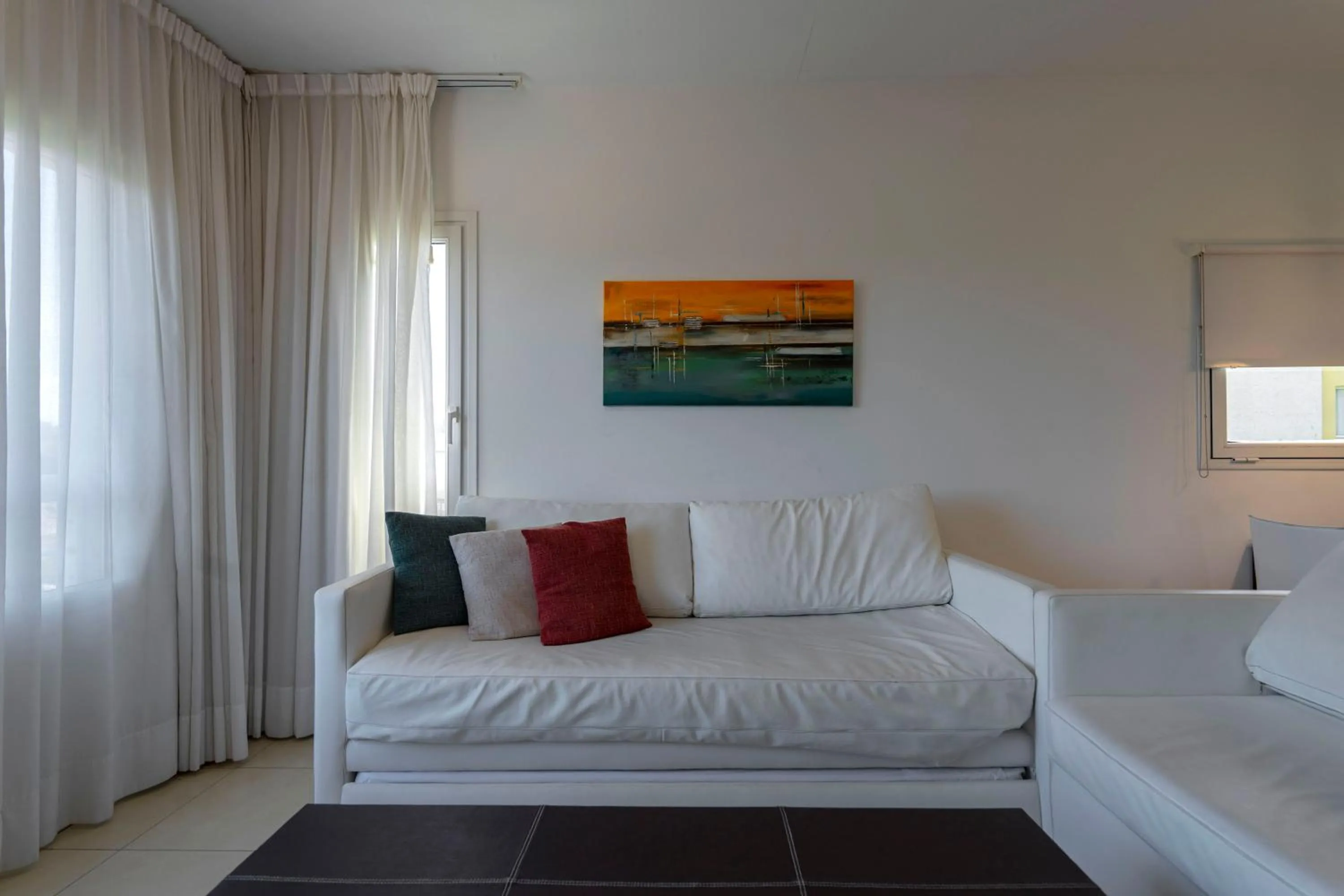 Living room, Bed in Valeria Playa Apart