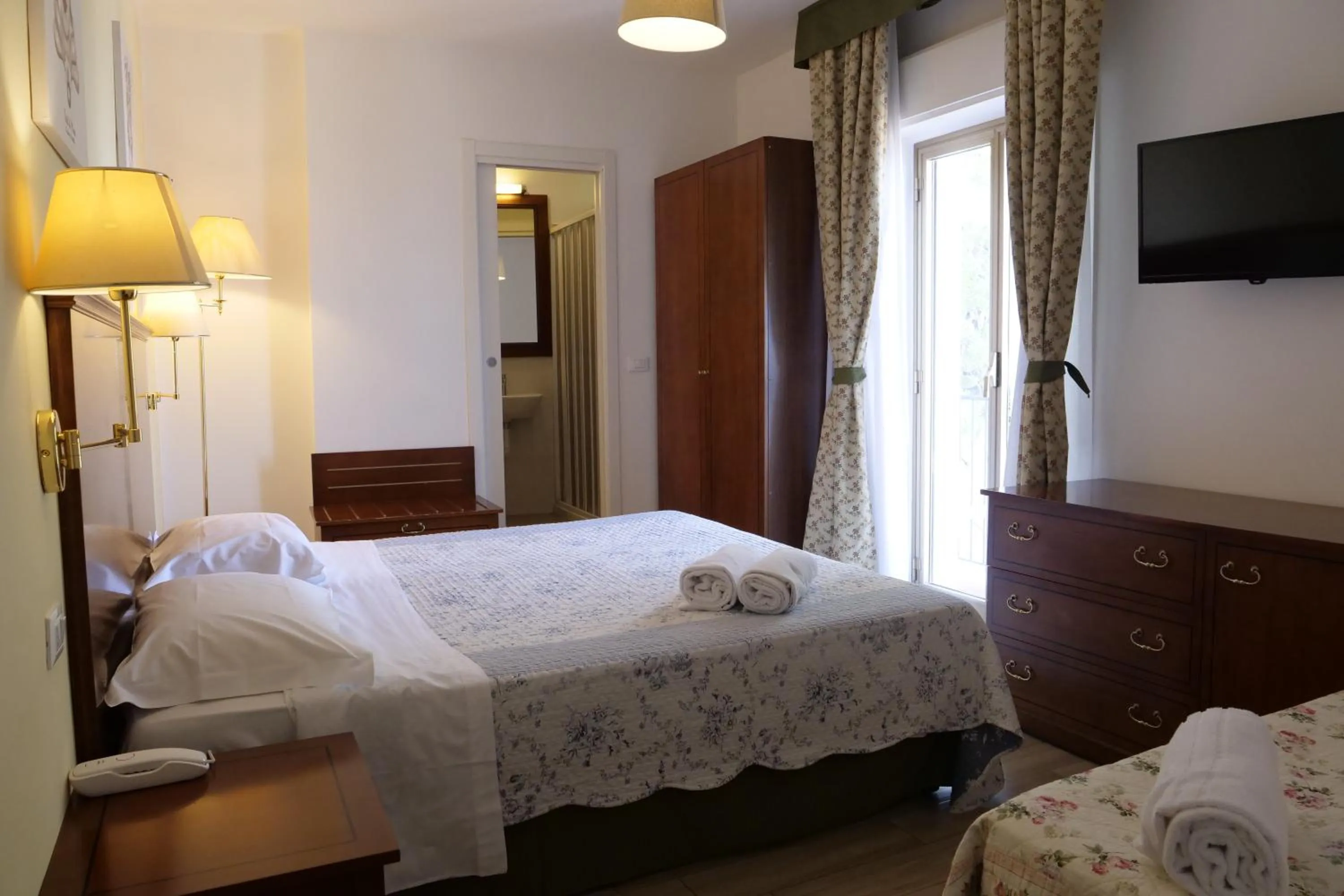 Photo of the whole room, Bed in Hotel Elios Tao