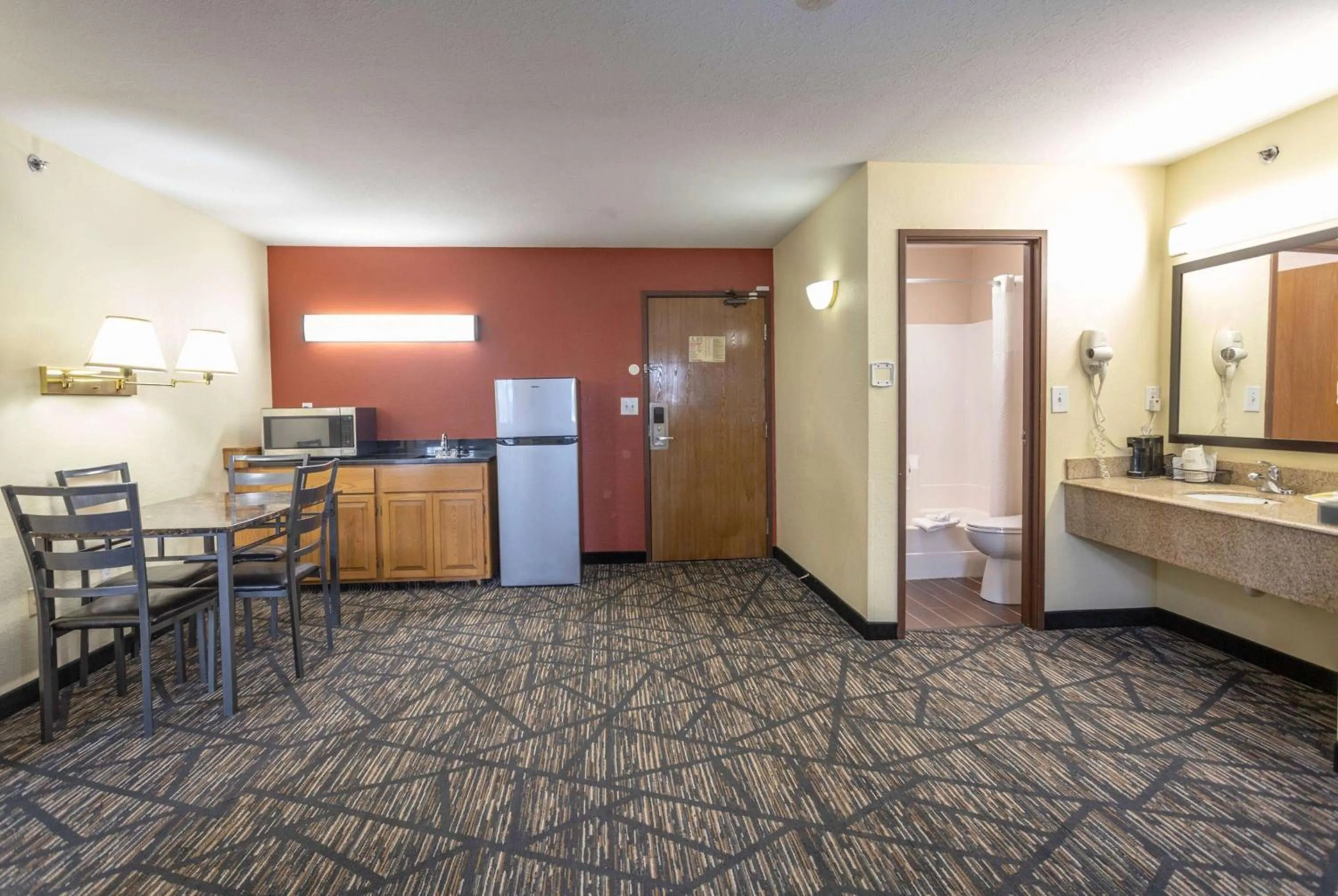 Photo of the whole room in Super 8 by Wyndham Big Rapids