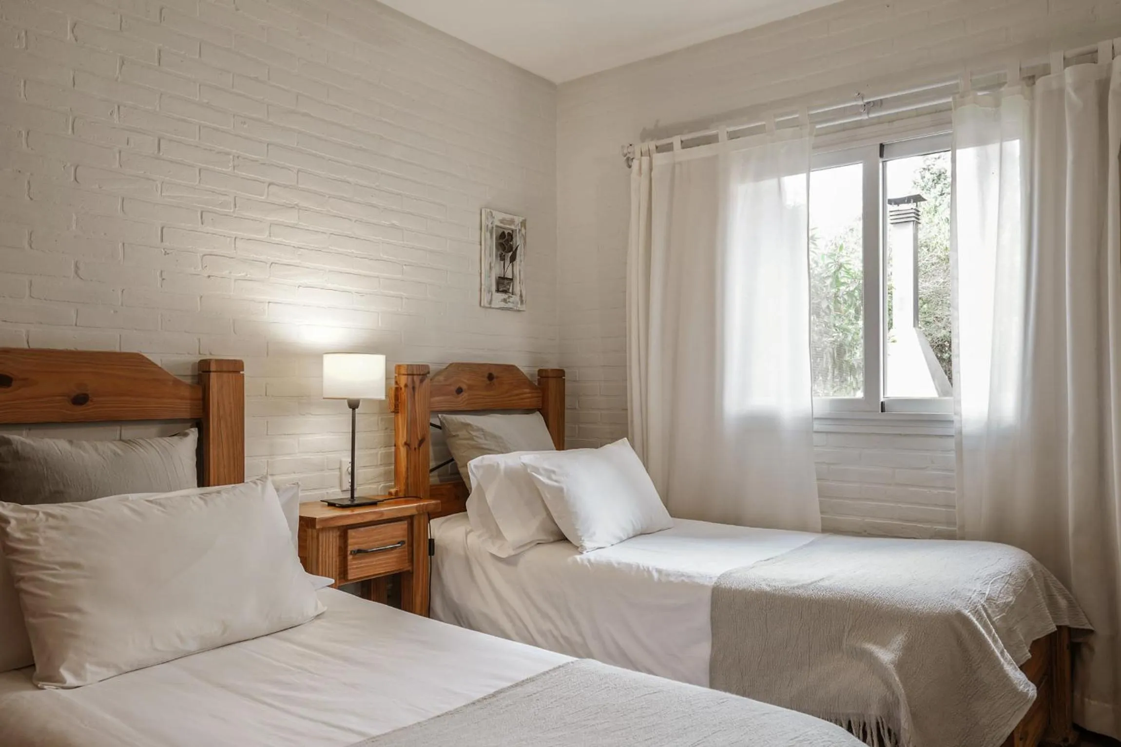 Bed in Valeria House Rental Suites