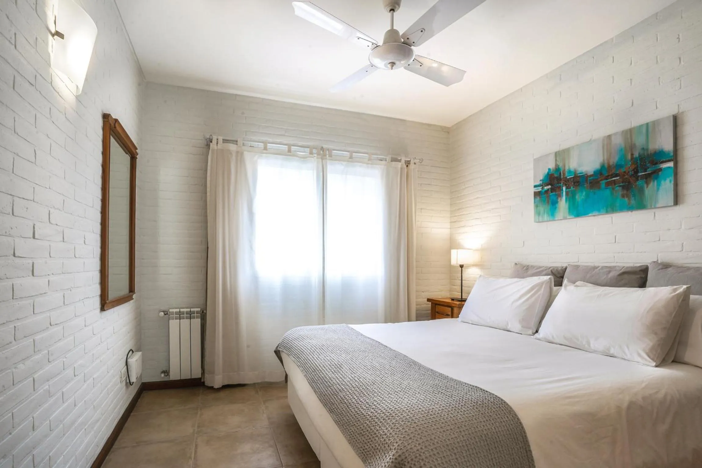 Bed in Valeria House Rental Suites