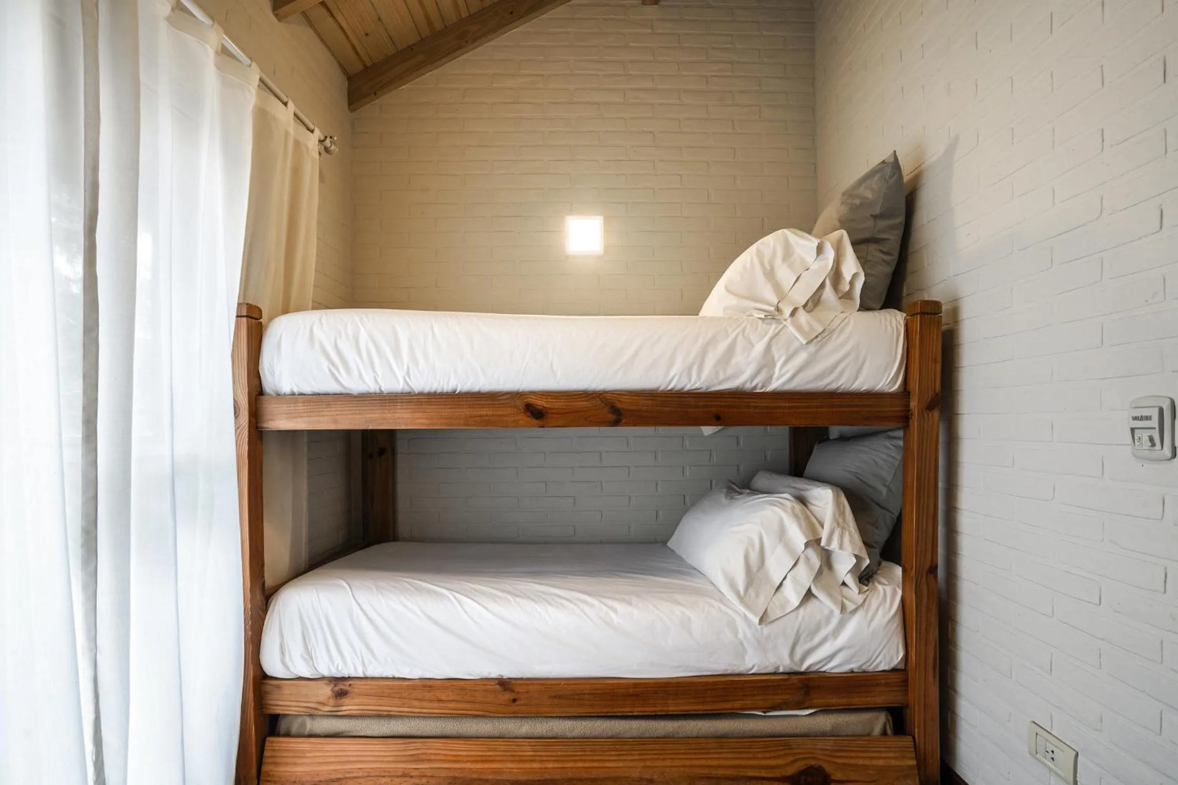 Bed in Valeria House Rental Suites