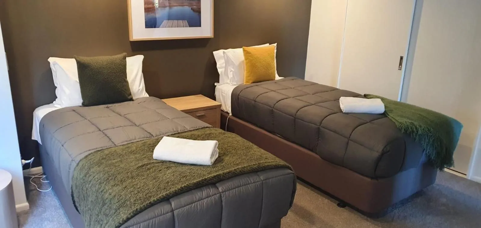 Photo of the whole room, Bed in Lakefront Apartments,18 LAKE ESPLANADE ROAD