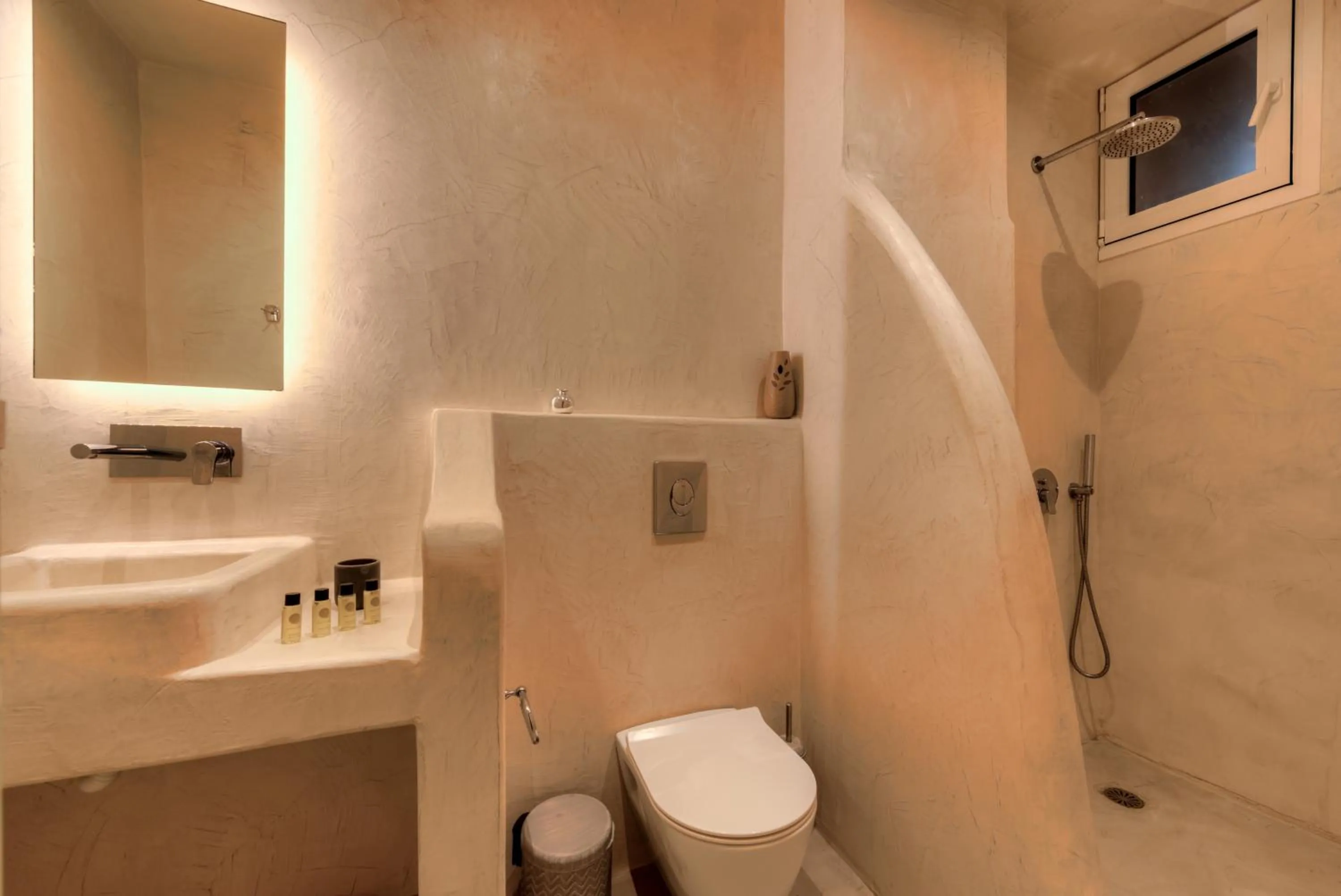 Bathroom in The Muses of Santorini Private Jacuzzi Suites