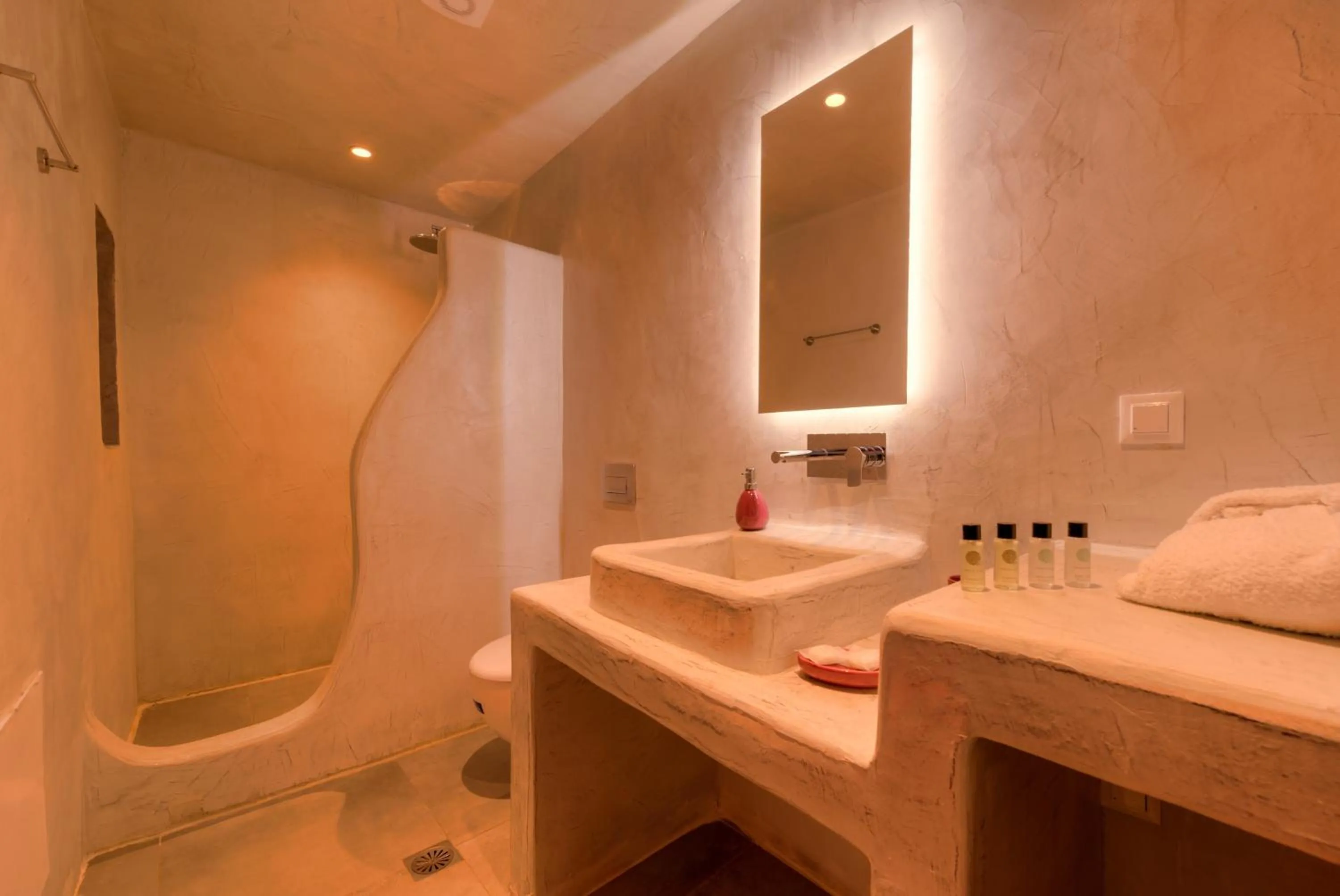 Bathroom in The Muses of Santorini Private Jacuzzi Suites