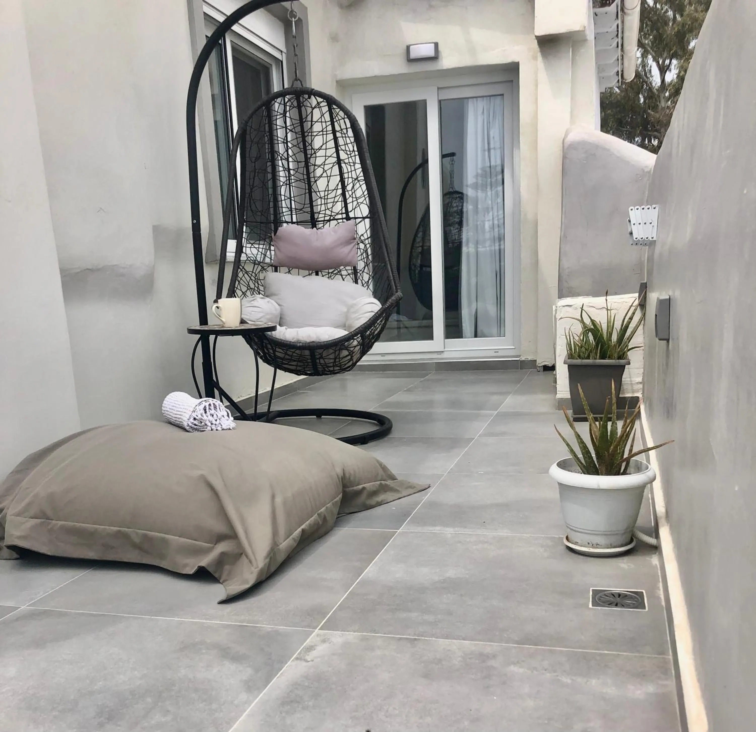 Photo of the whole room in The Muses of Santorini Private Jacuzzi Suites