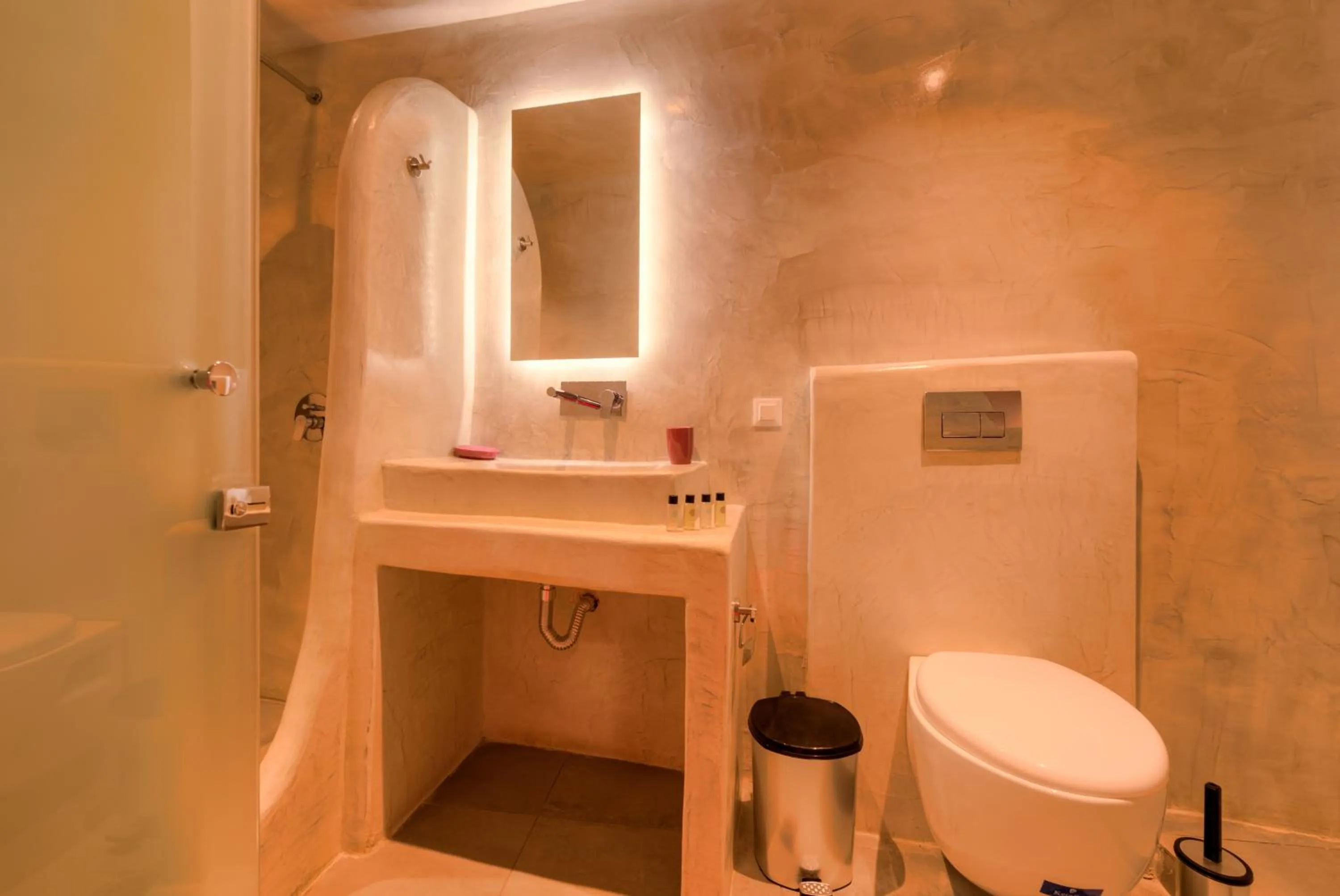 Bathroom in The Muses of Santorini Private Jacuzzi Suites