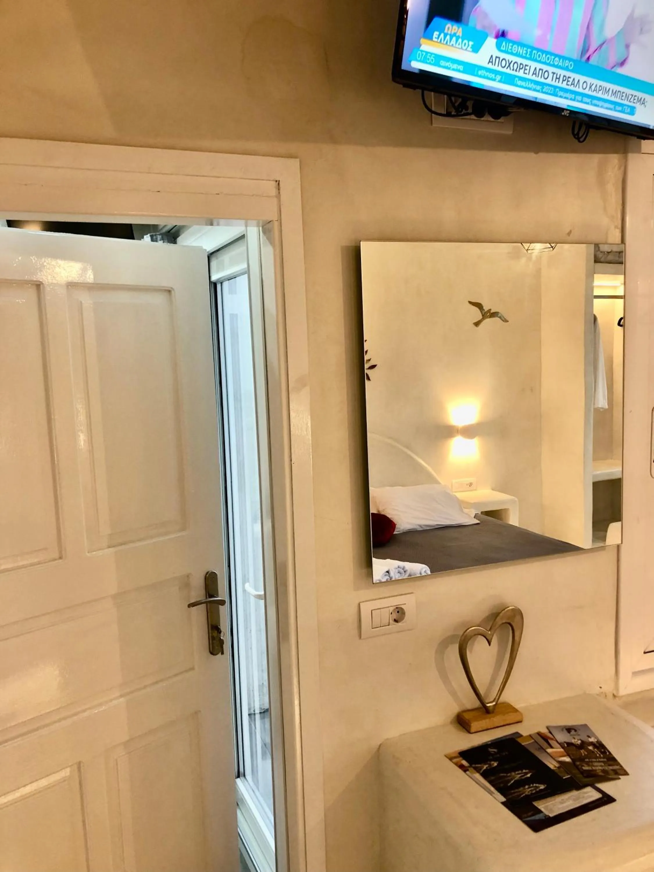 Photo of the whole room in The Muses of Santorini Private Jacuzzi Suites