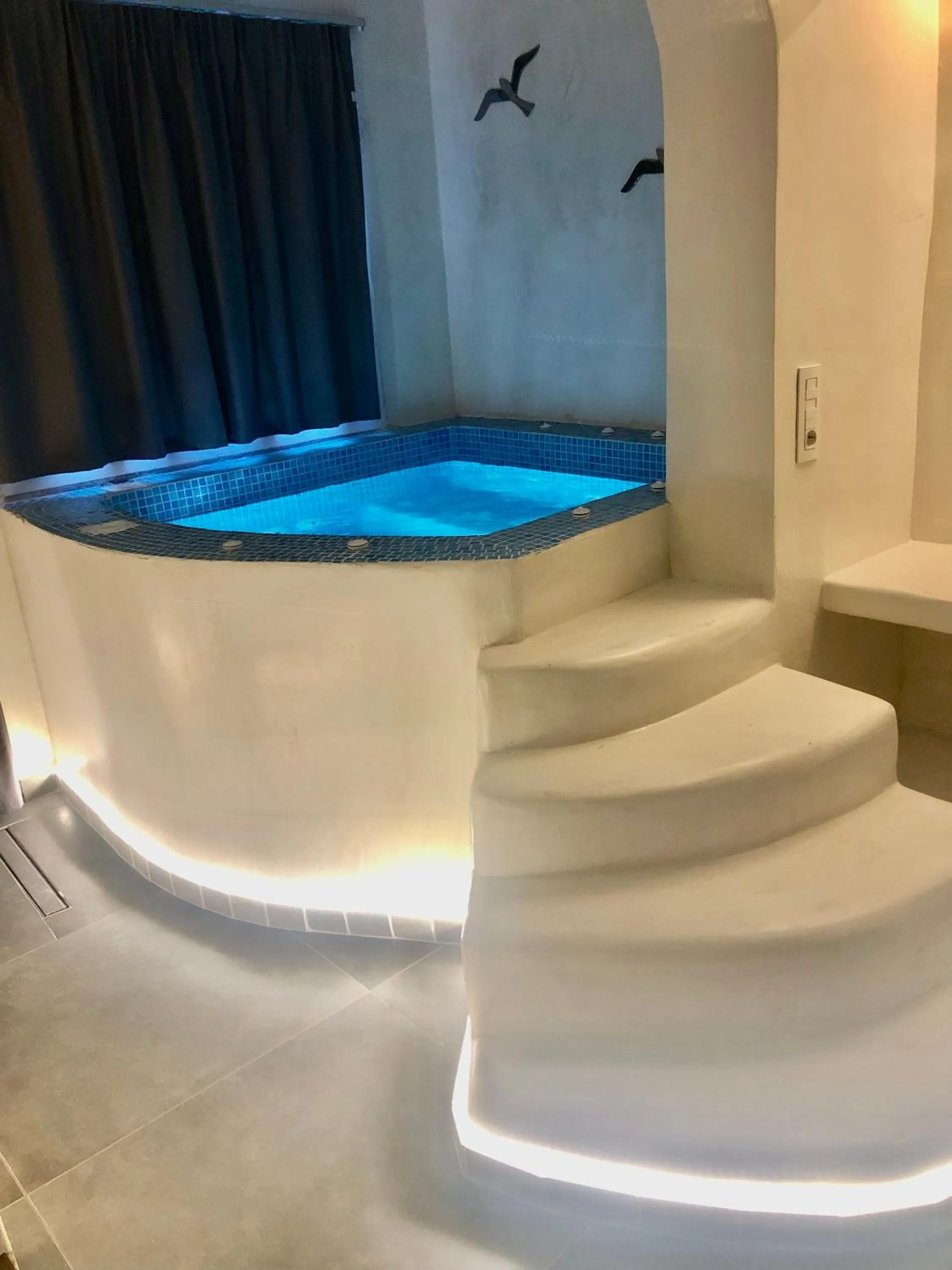 Hot Tub in The Muses of Santorini Private Jacuzzi Suites