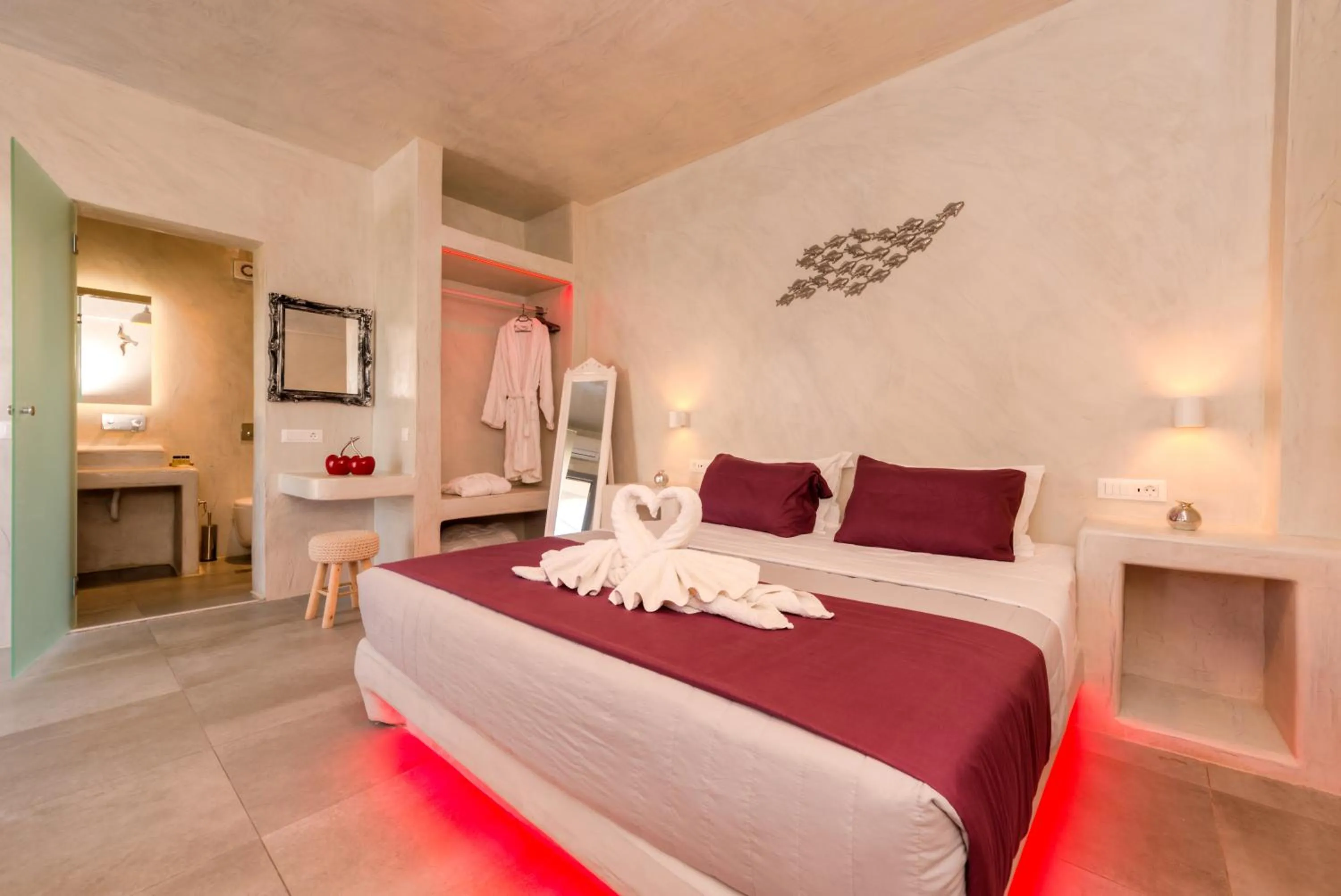 Photo of the whole room, Bed in The Muses of Santorini Private Jacuzzi Suites