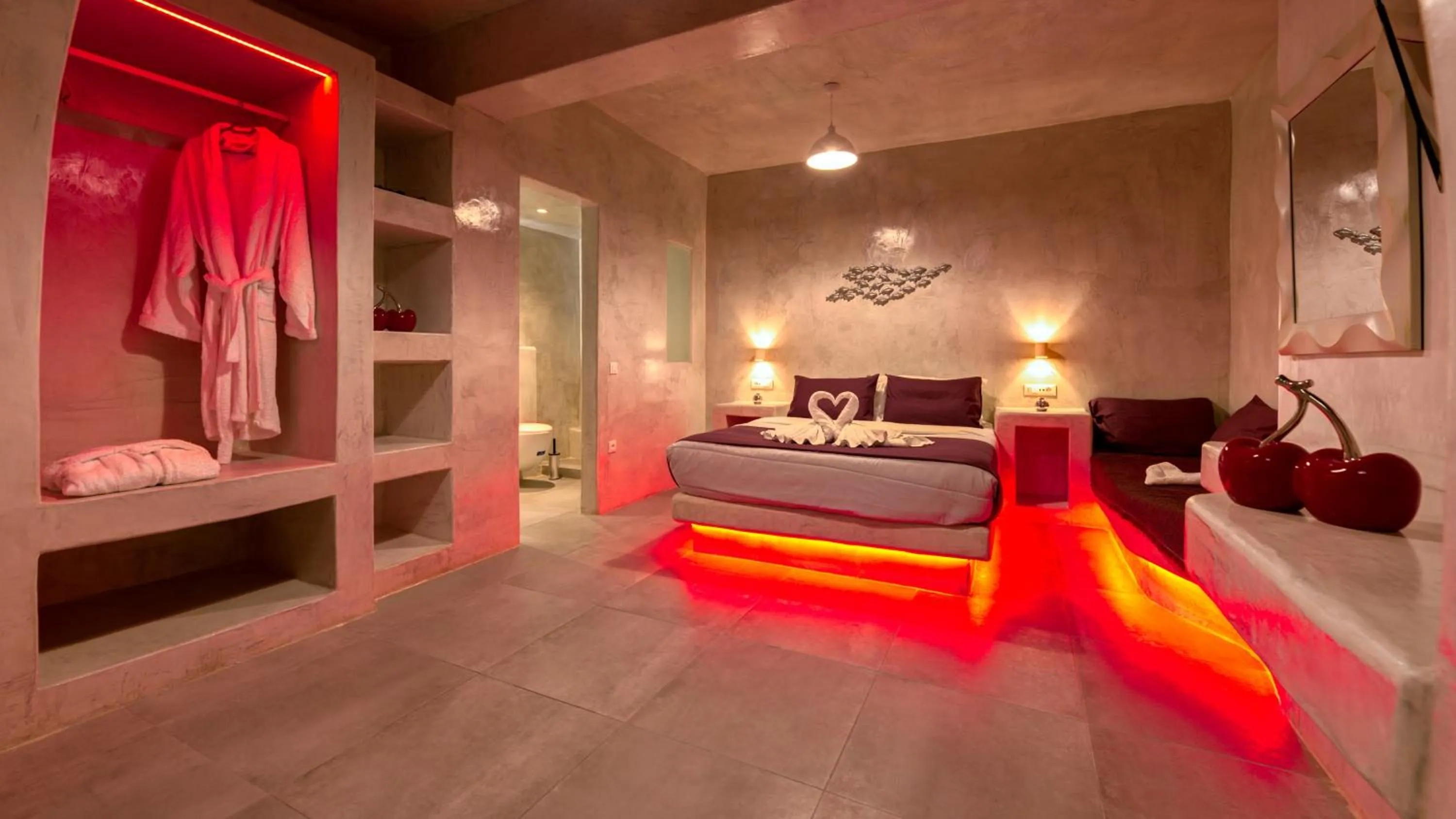 Photo of the whole room, Bed in The Muses of Santorini Private Jacuzzi Suites