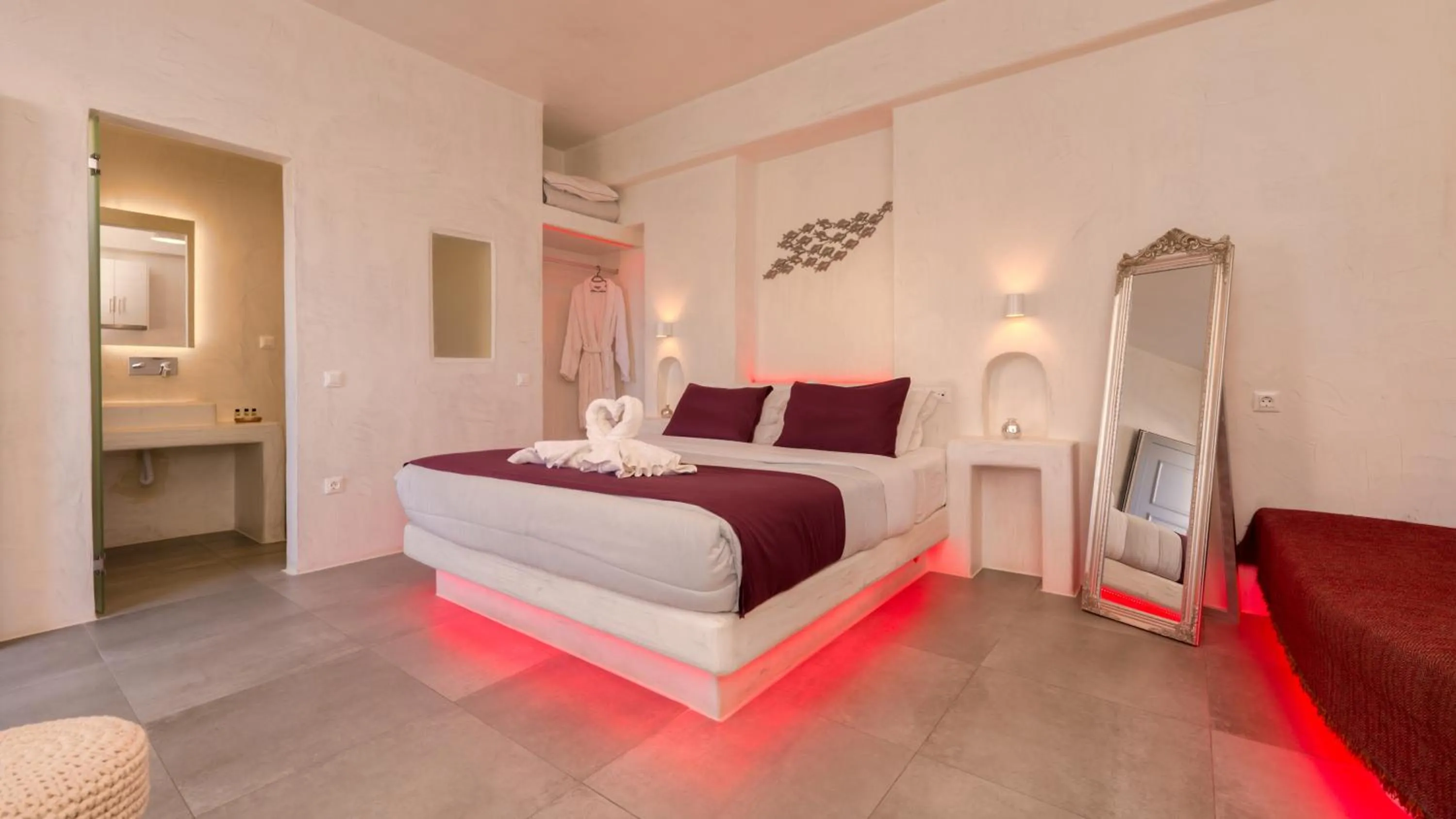 Bedroom, Bed in The Muses of Santorini Private Jacuzzi Suites