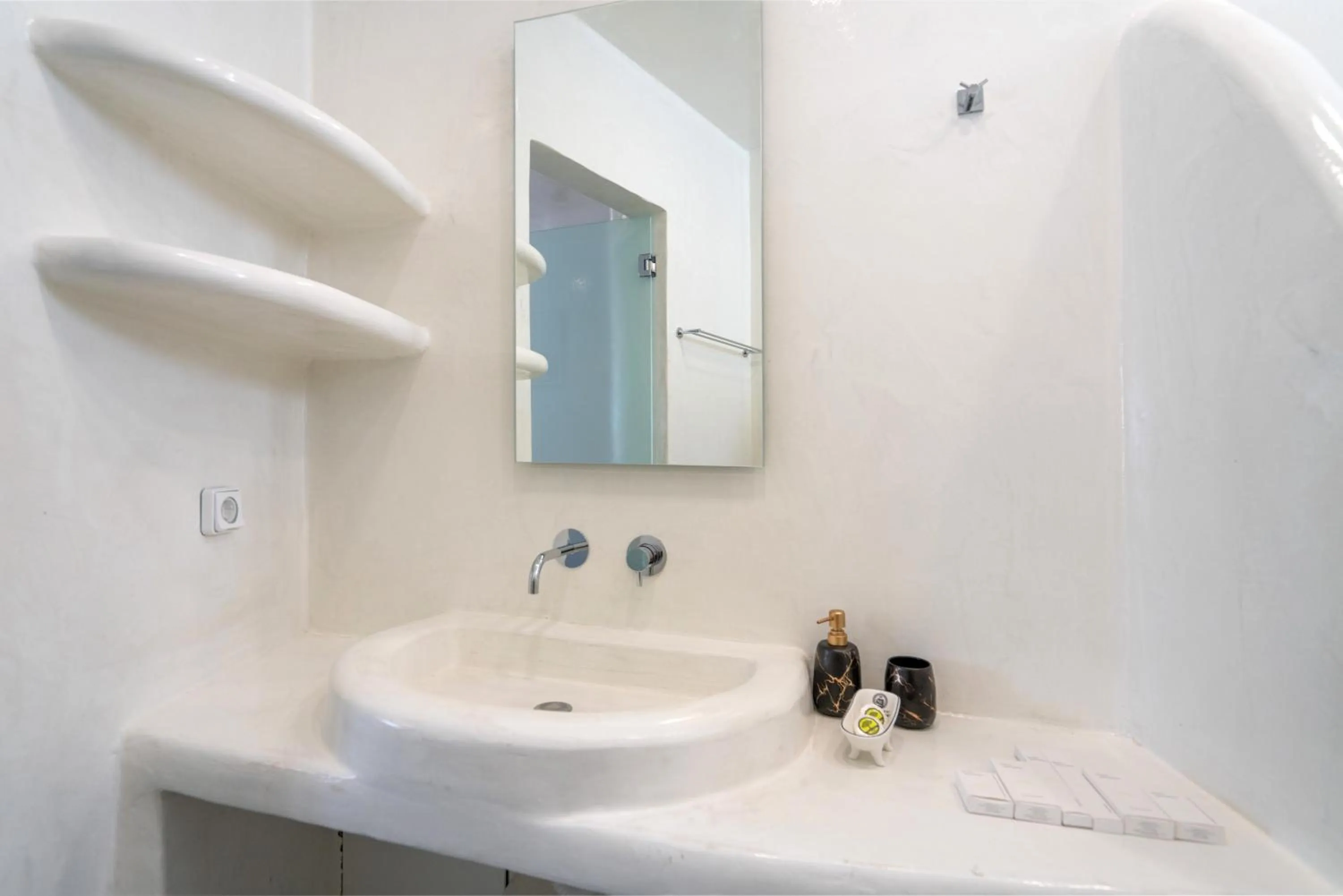 Bathroom in The Muses of Santorini Private Jacuzzi Suites