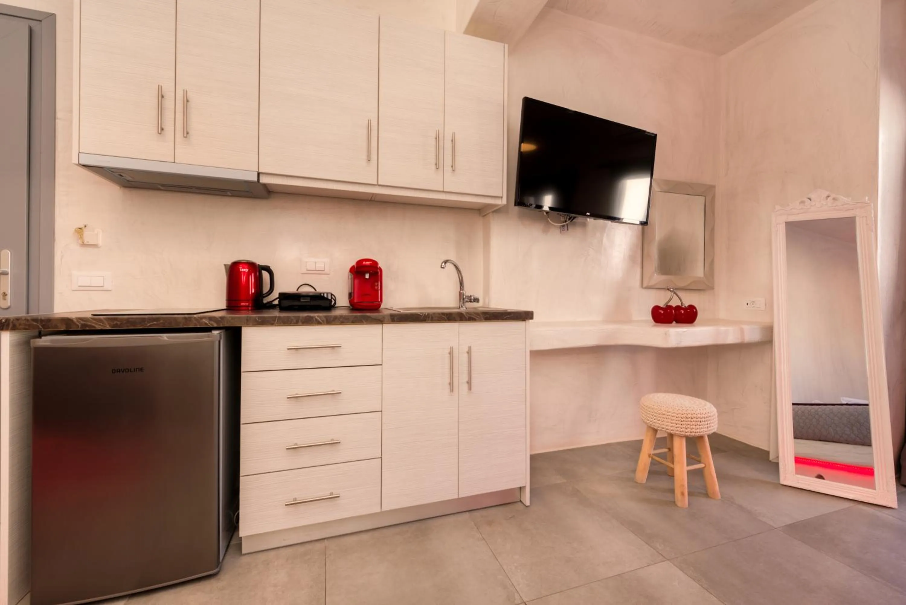 Kitchen or kitchenette in The Muses of Santorini Private Jacuzzi Suites