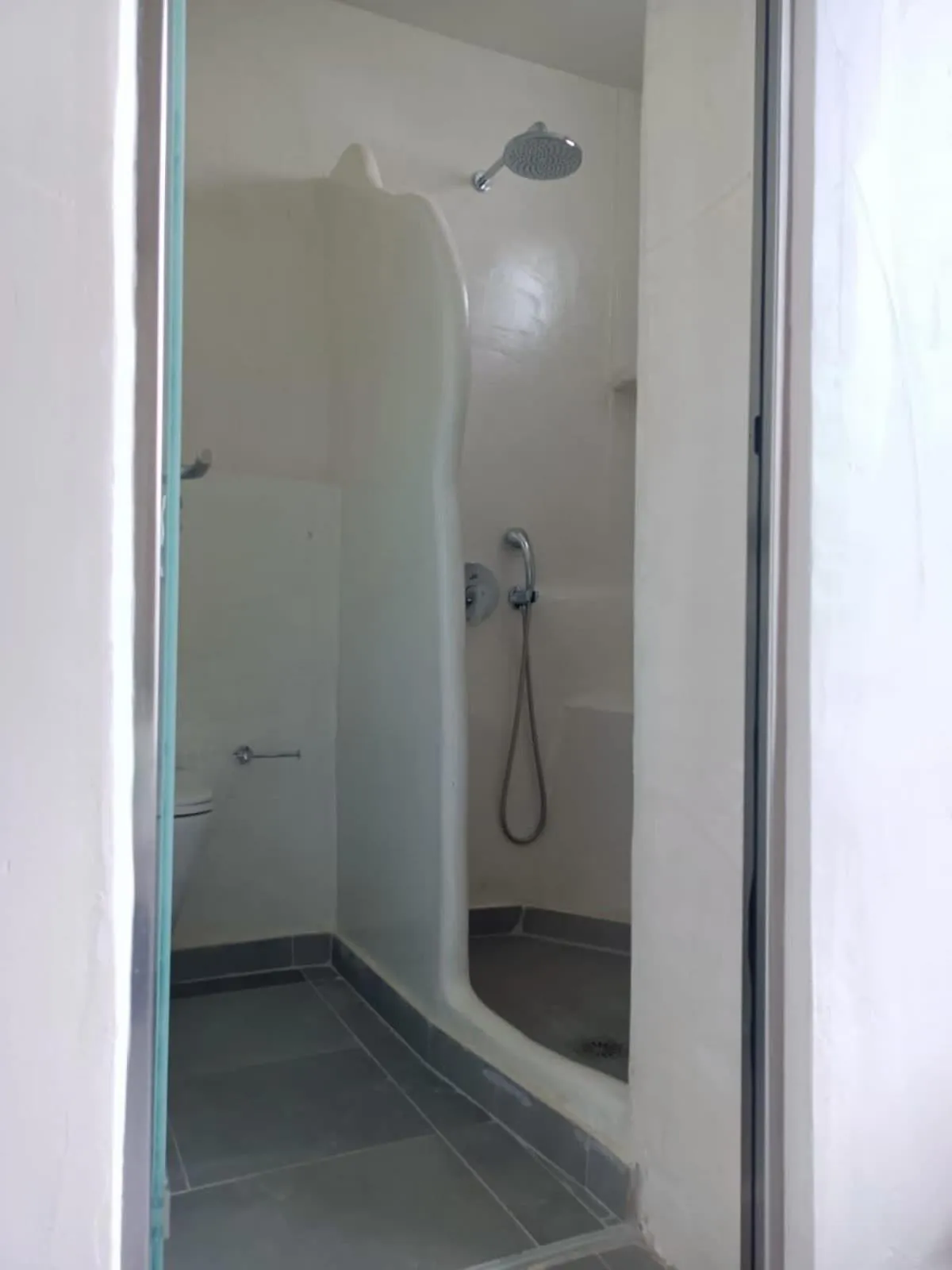 Shower in The Muses of Santorini Private Jacuzzi Suites