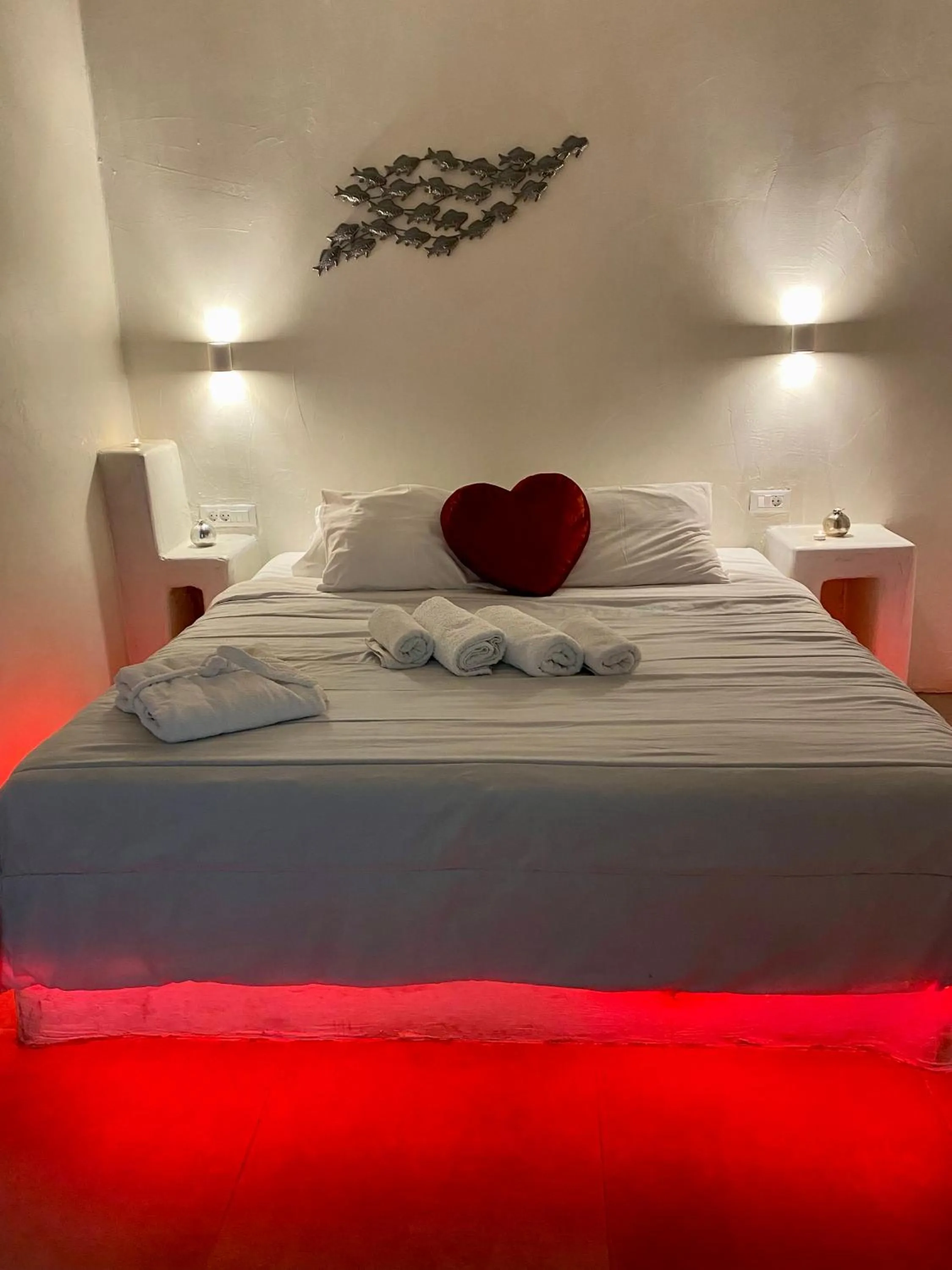 Bedroom, Bed in The Muses of Santorini Private Jacuzzi Suites