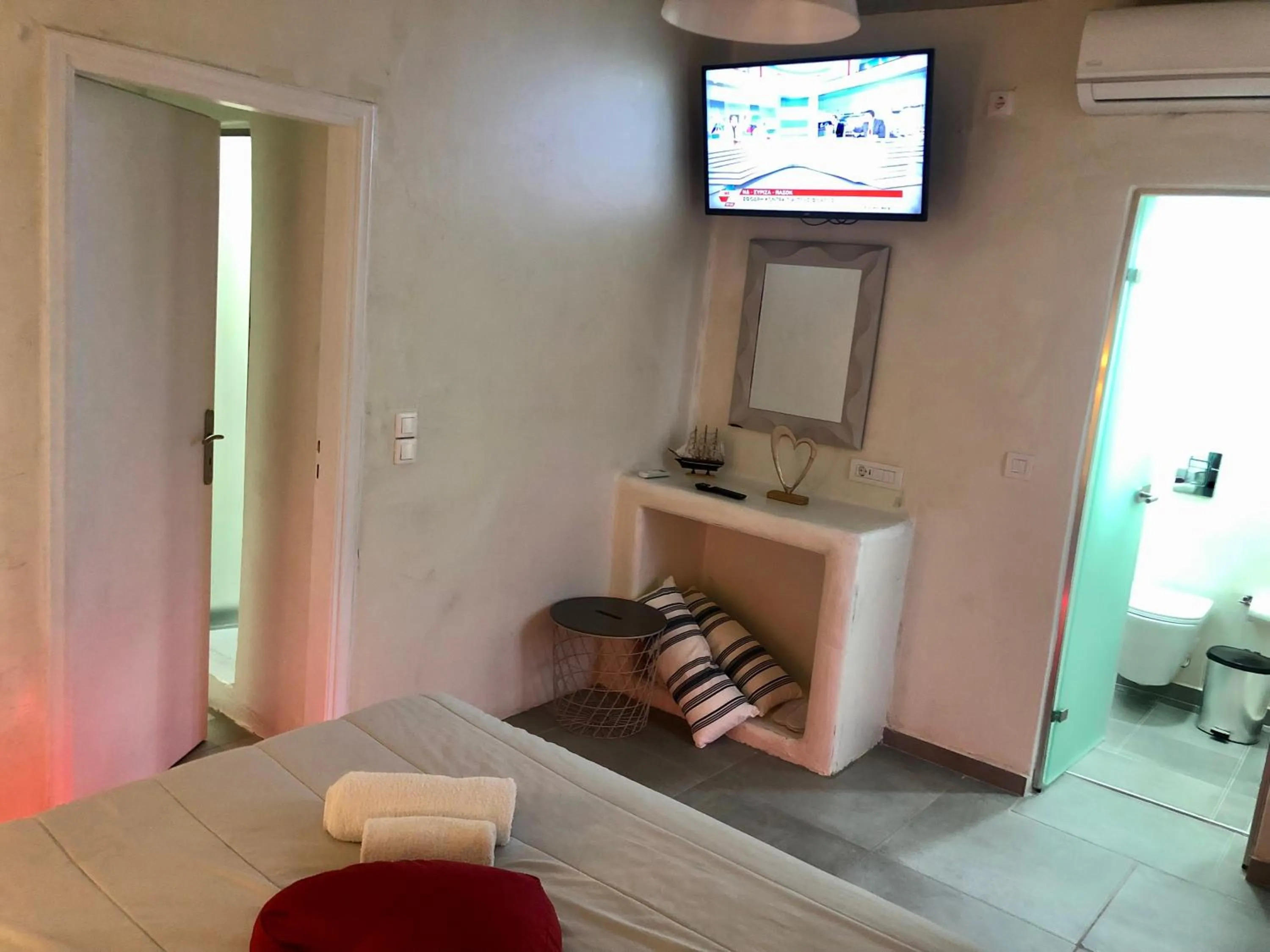 Bedroom, Bed in The Muses of Santorini Private Jacuzzi Suites