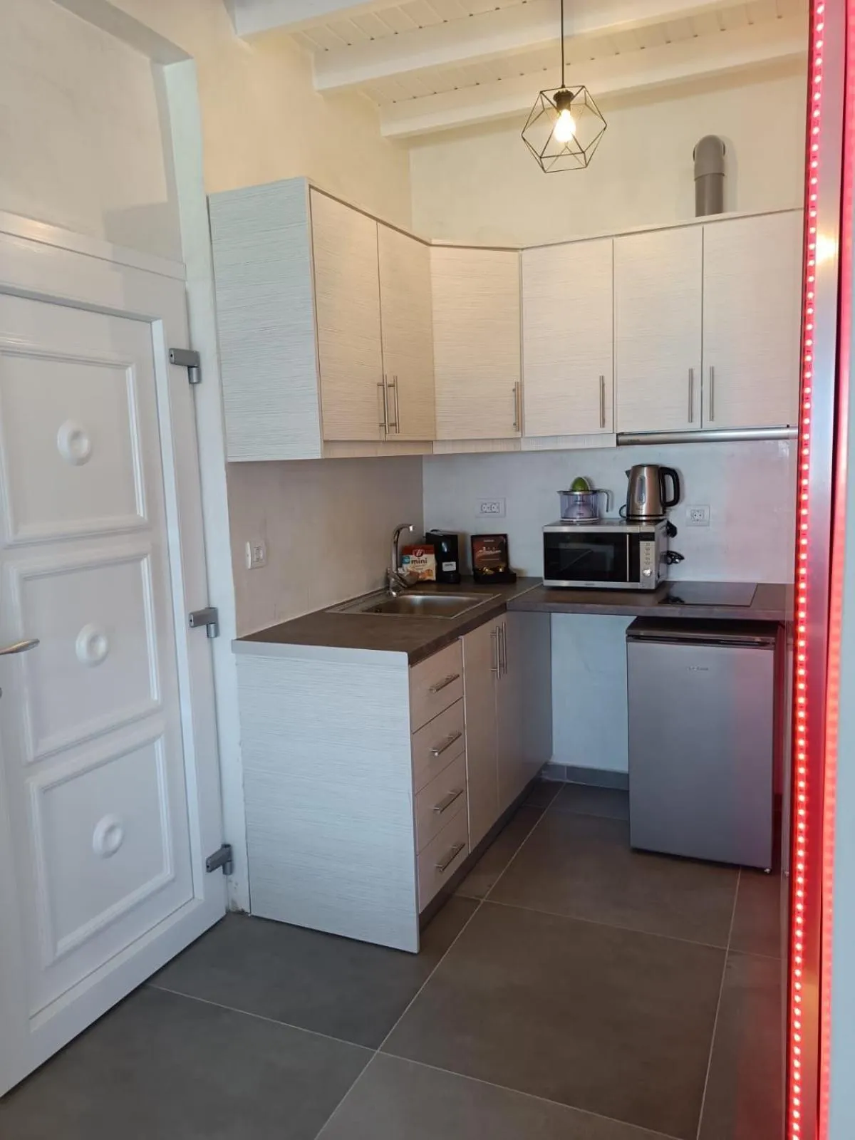 stove in The Muses of Santorini Private Jacuzzi Suites