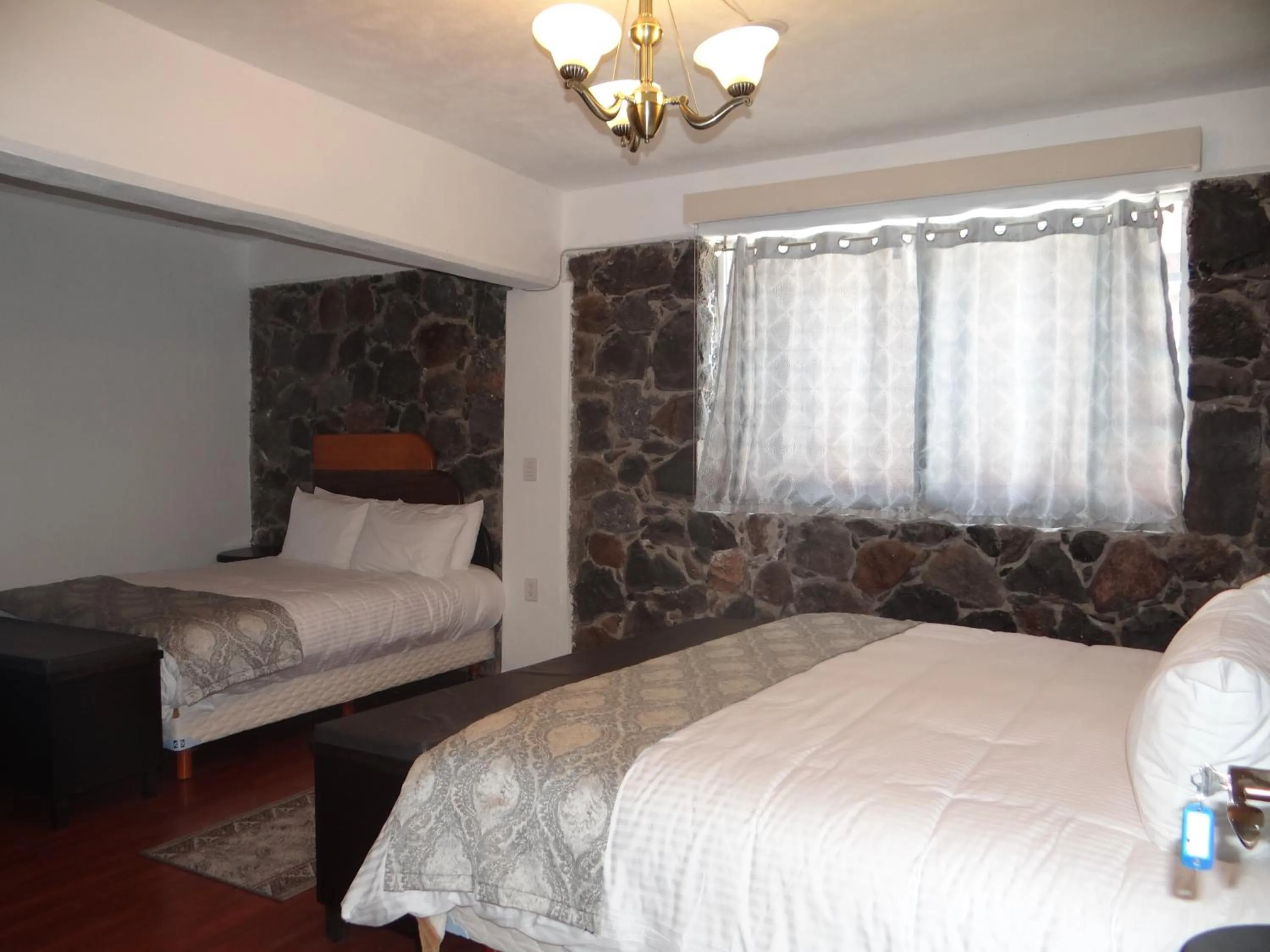 Bed in Regis Hotel Boutique