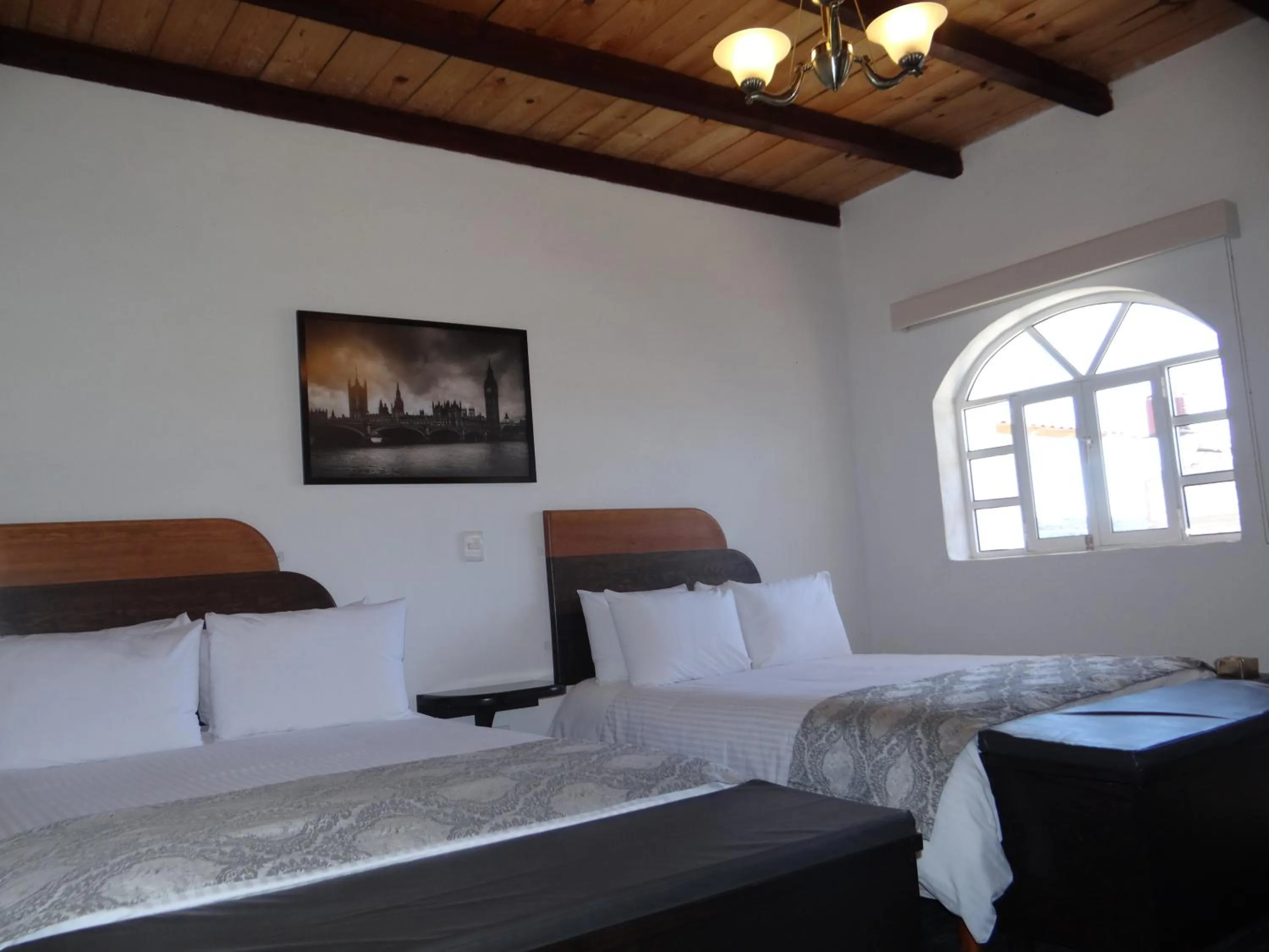 Bed in Regis Hotel Boutique