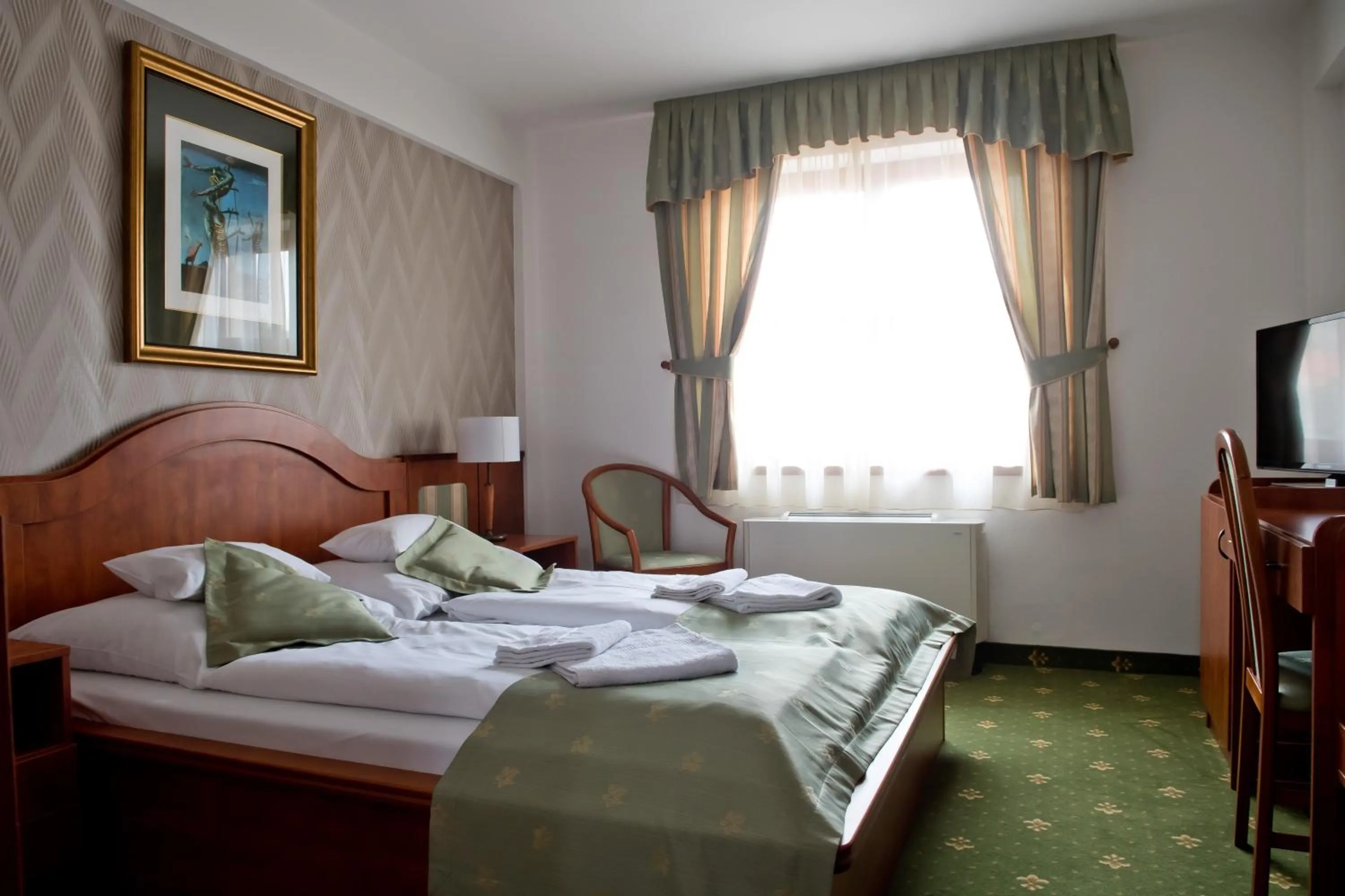 Photo of the whole room, Bed in Toldi Fogadó