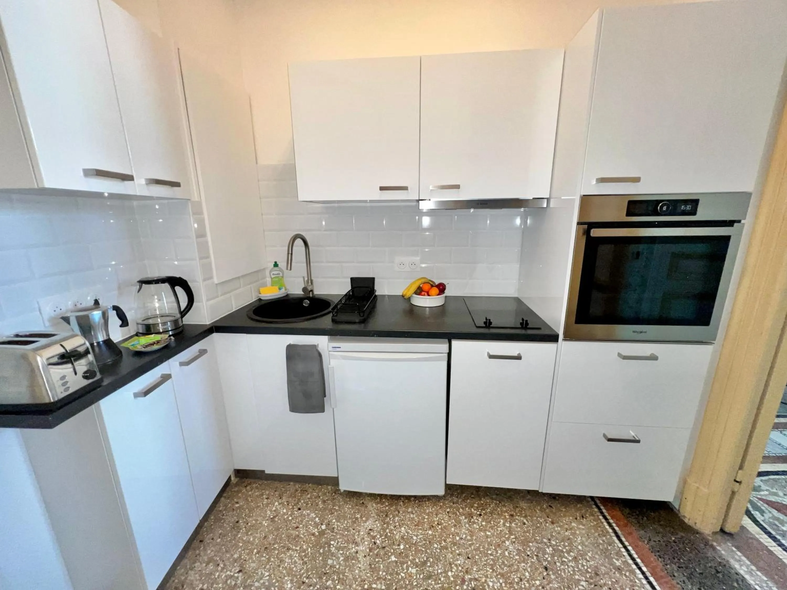 Kitchen or kitchenette in Résidence La Villa Léonie