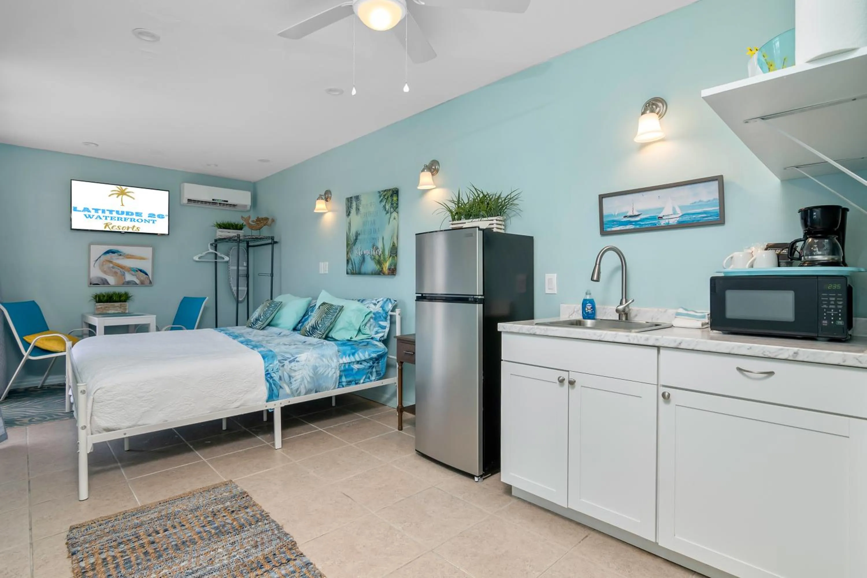Photo of the whole room, Bed in Latitude 26 Waterfront Boutique Resort - Bonita Springs