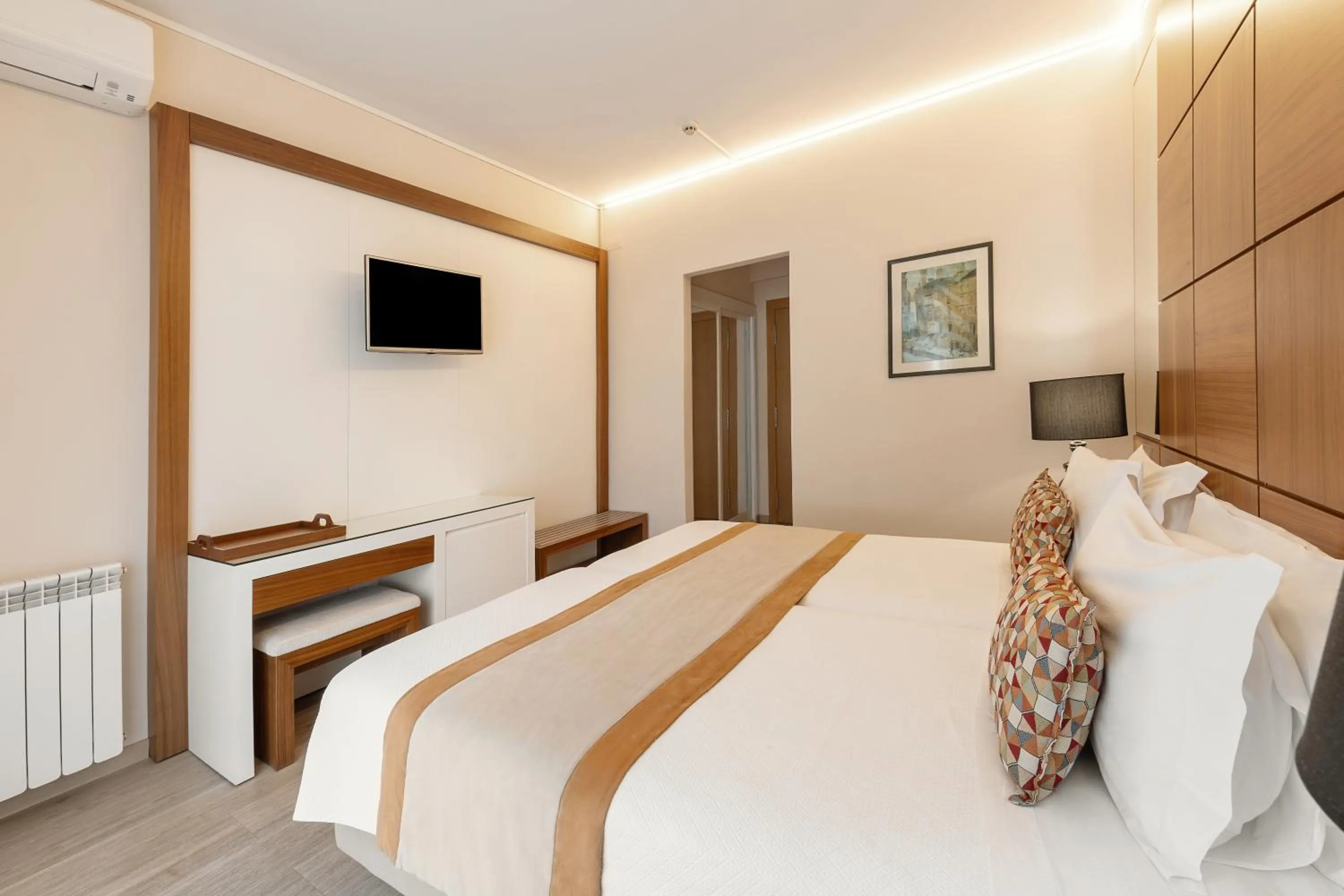 Communal lounge/ TV room, Bed in Hotel Lido